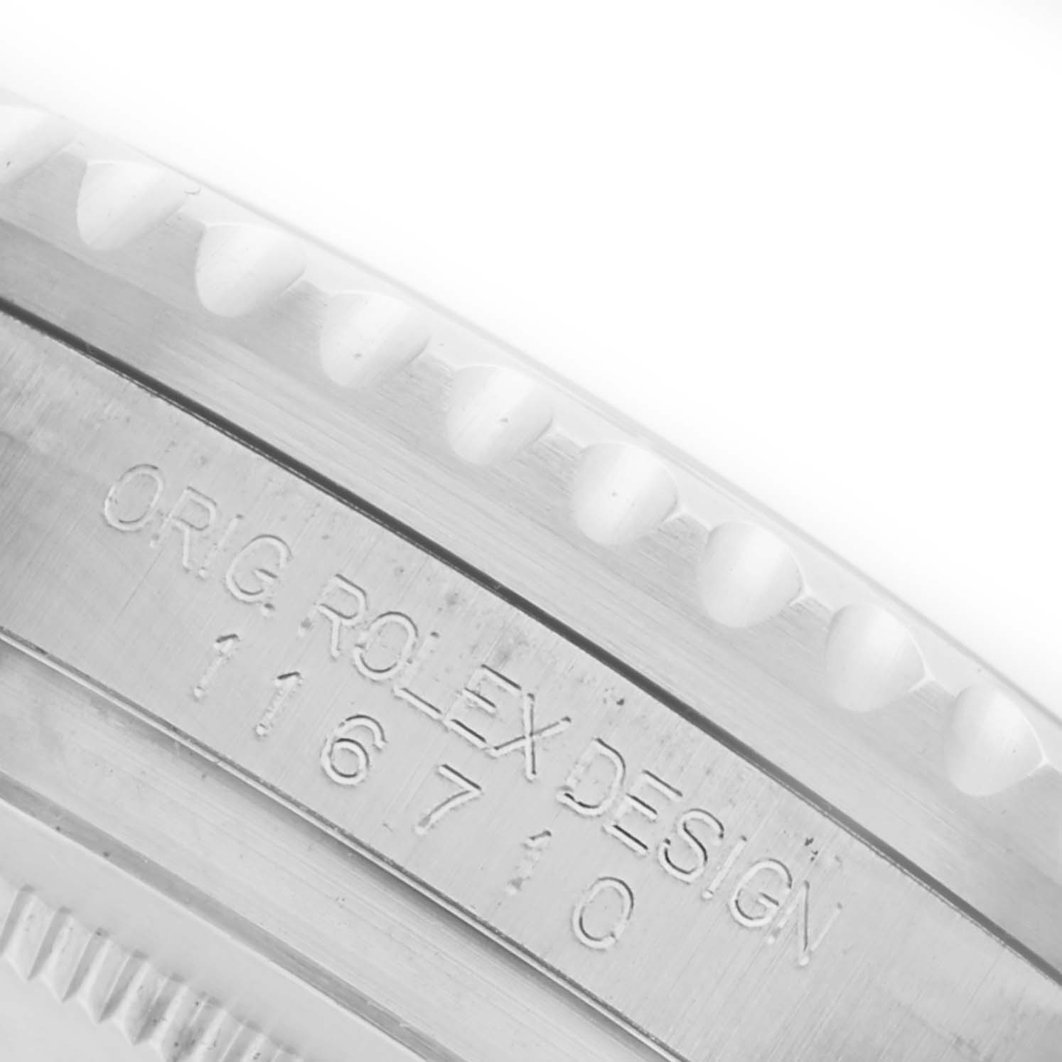 The image shows a close-up of the side engraving on the bezel of a Rolex GMT-Master 116710LN Men
s Stainless Steel Black Dial 116710LN Men
s Stainless Steel Black Dial, displaying the model number.