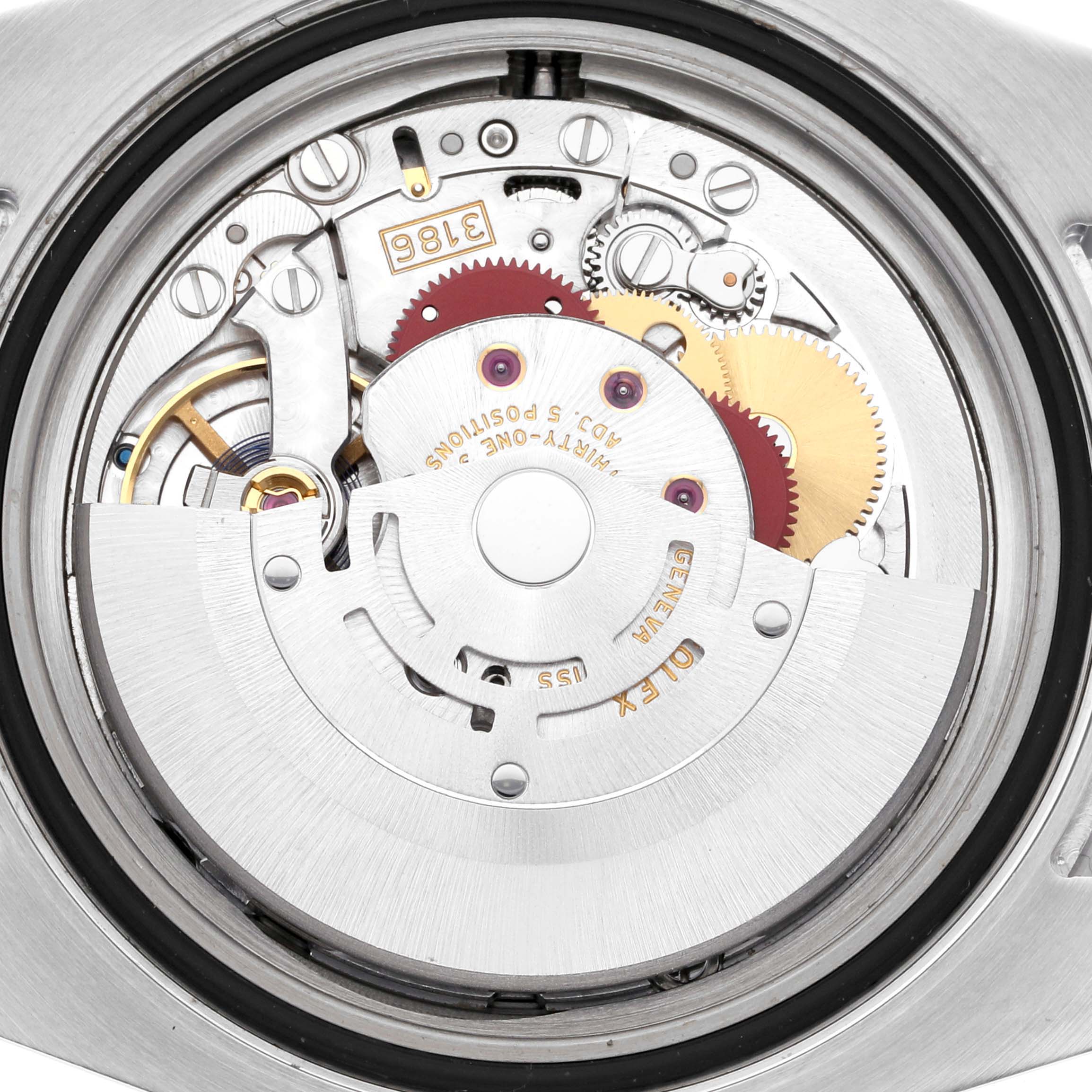 The image shows the movement of a Rolex GMT-Master 116710LN Men
s Stainless Steel Black Dial 116710LN Men
s Stainless Steel Black Dial watch from the back angle, revealing gears and components.