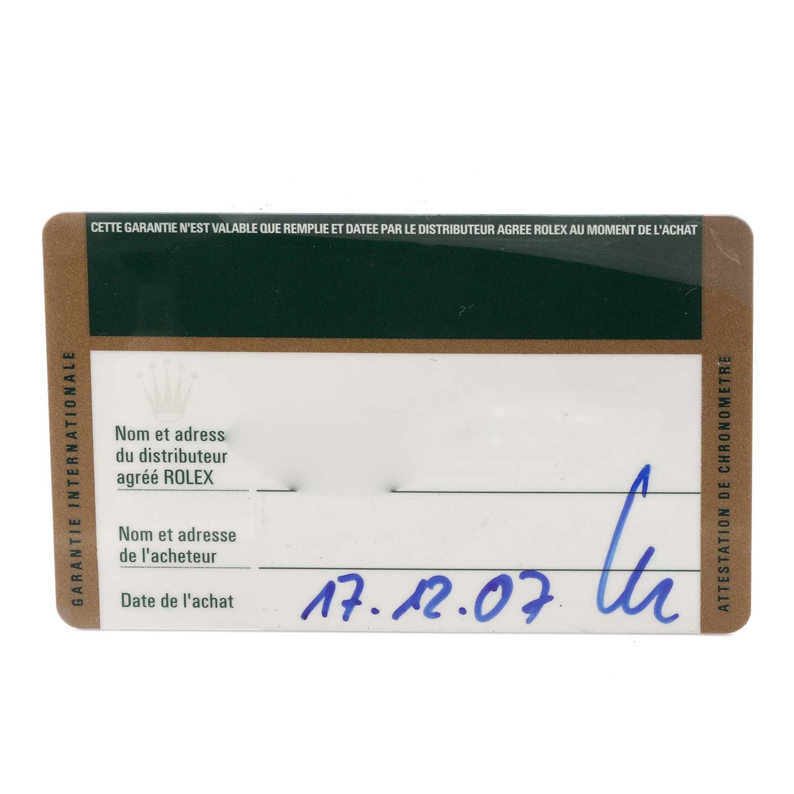 The image shows a warranty card for the Rolex GMT-Master 116710LN Men
s Stainless Steel Black Dial 116710LN Men
s Stainless Steel Black Dial model, viewed from the top, with handwritten details visible.