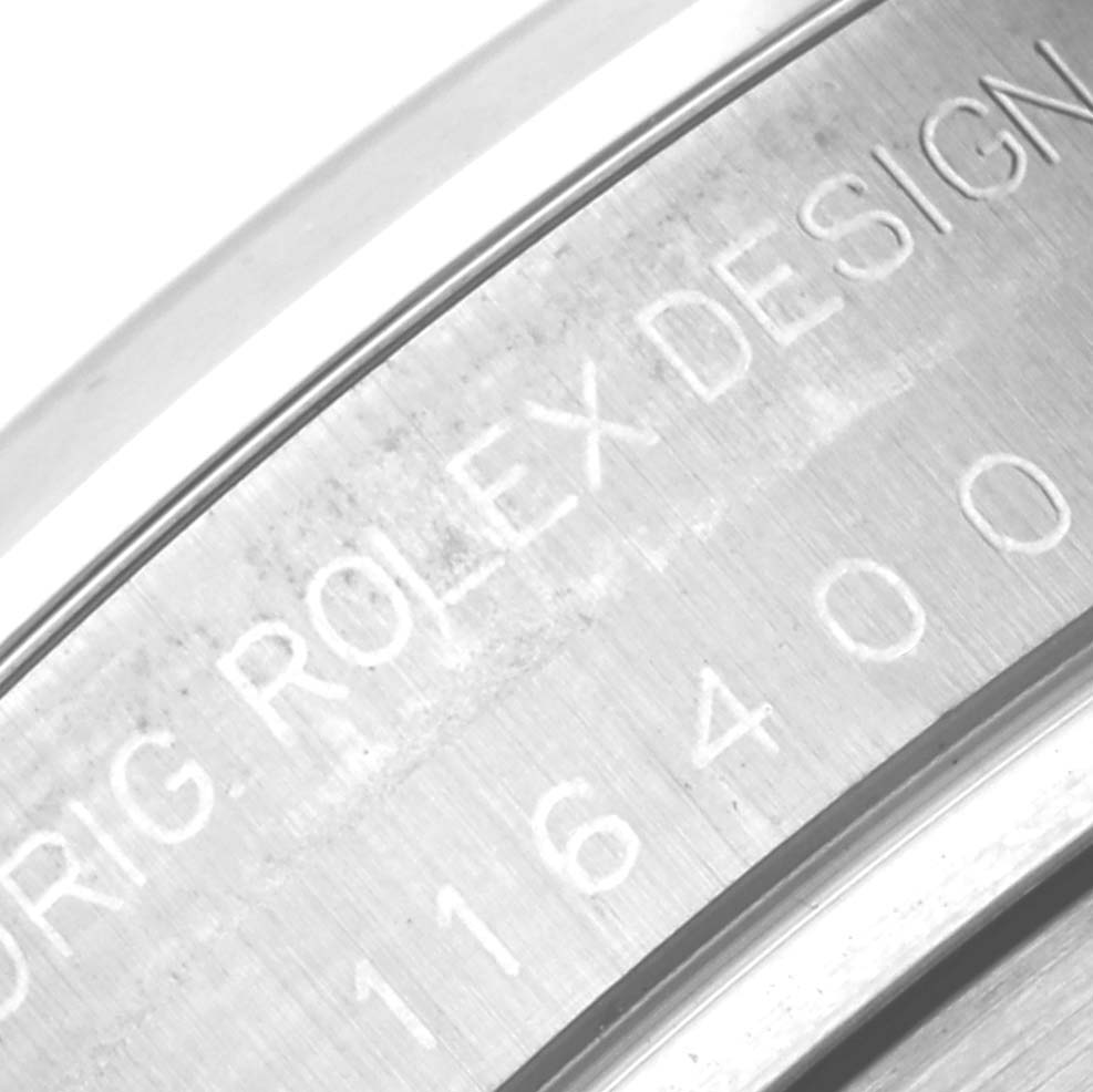 This image shows a close-up of the engraving on the inner bezel of a Rolex Milgauss 116400 Men's Stainless Steel White Dial 116400 Men's Stainless Steel White Dial.