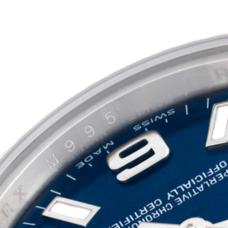 This image shows a close-up of the dial and bezel of a Rolex Oyster Perpetual 176234 Women's Stainless Steel Blue Dial 176234 Women's Stainless Steel Blue Dial watch, focusing on the top right section.