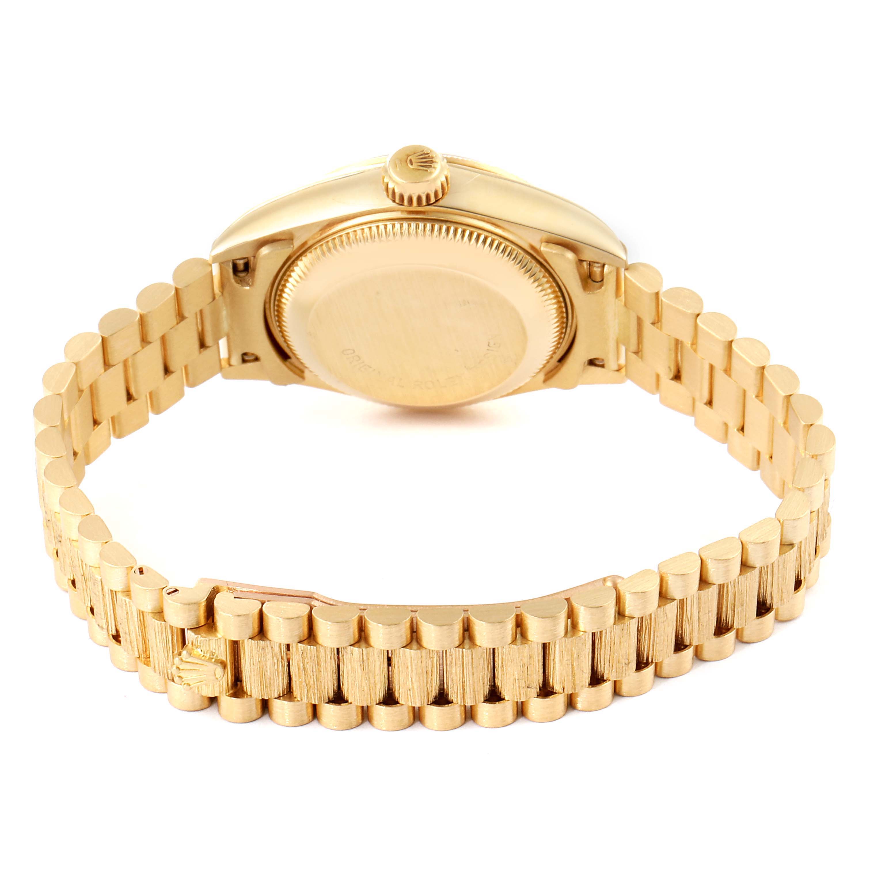 The image shows the back view of a Rolex President 69278 Women
s Yellow Gold Champagne Dial 69278 Women
s Yellow Gold Champagne Dial model watch, displaying the case back and the President bracelet.