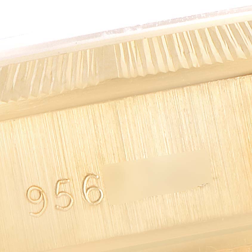 The image shows a close-up of the band and part of the clasp of a Rolex President 69278 Women
s Yellow Gold Champagne Dial 69278 Women
s Yellow Gold Champagne Dial watch with the model number partially visible.