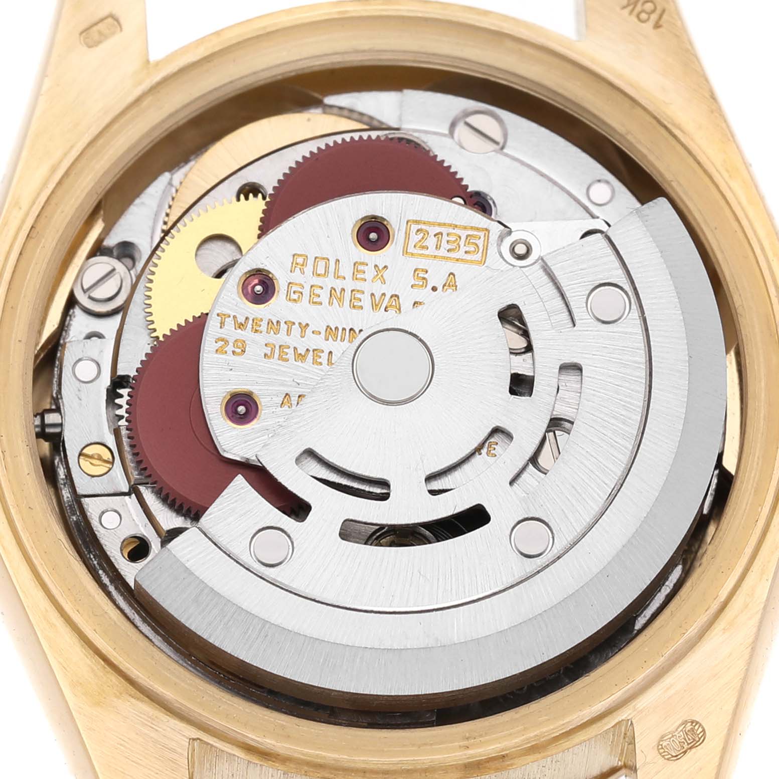 The image shows the movement of a Rolex President 69178 Women's Yellow Gold Champagne Dial watch with an emphasis on gears and the rotor.