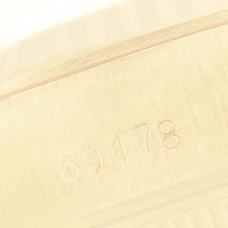 This close-up shows the model number "69178" engraved on the side of the Rolex President 69178 Women
s Yellow Gold White Dial 69178 Women
s Yellow Gold White Dial watch case.