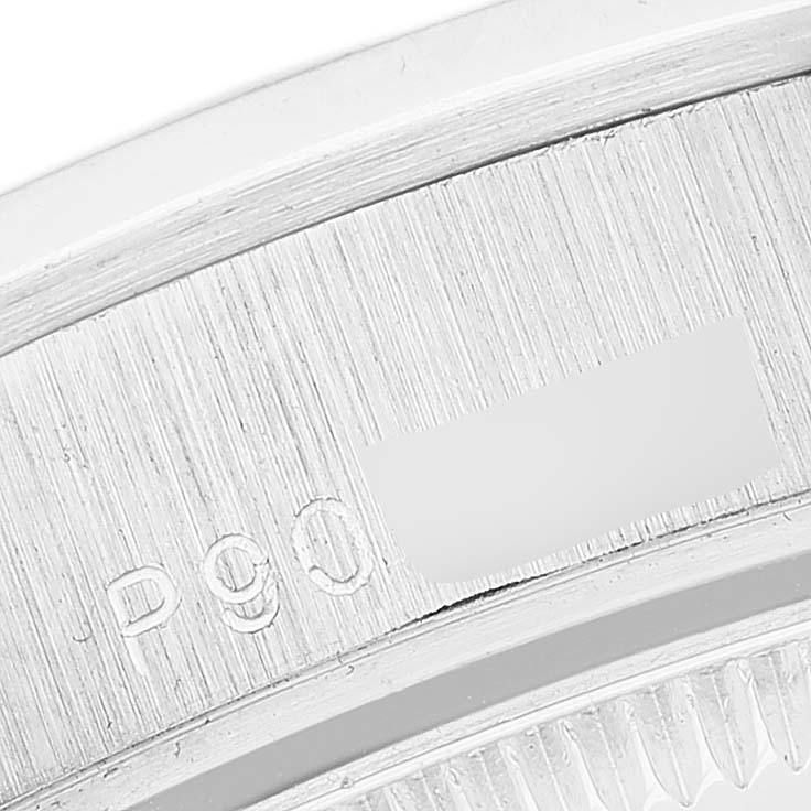 The image shows a close-up of the caseback engraving on a Rolex President 78246 Women's Platinum Silver Dial model watch.