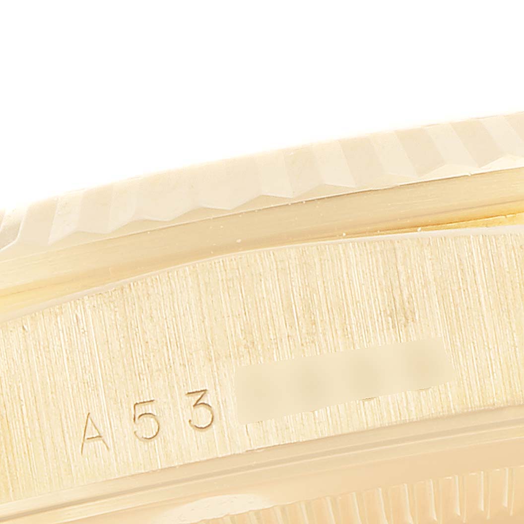 This image shows a close-up of the side case and fluted bezel of a Rolex President 18238 Men's Yellow Gold Champagne Dial 18238 Men's Yellow Gold Champagne Dial model watch.