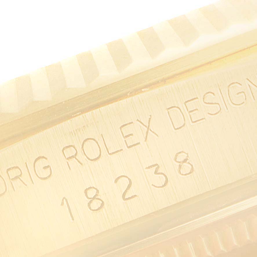 This image shows the engraved side detailing of the Rolex President 18238 Men's Yellow Gold Champagne Dial 18238 Men's Yellow Gold Champagne Dial model with the model number 18238.