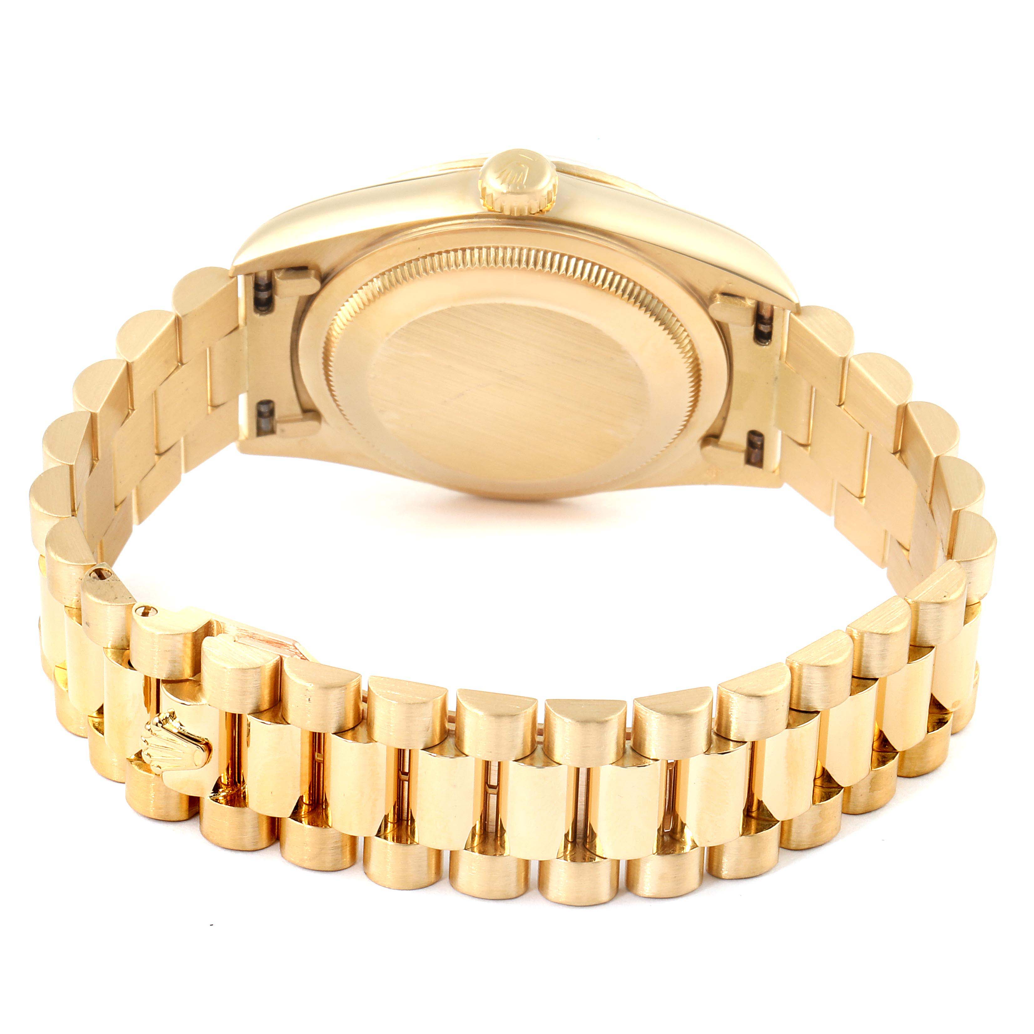 This image shows the back and bracelet of a Rolex President 18238 Men's Yellow Gold Champagne Dial 18238 Men's Yellow Gold Champagne Dial model watch from a rear angle.