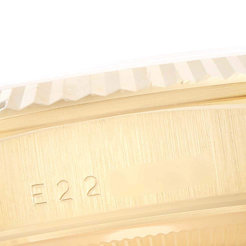 This image is a close-up angle showing the side and serial engraving of a Rolex President 18238 Men's Yellow Gold Champagne Dial 18238 Men's Yellow Gold Champagne Dial watch.