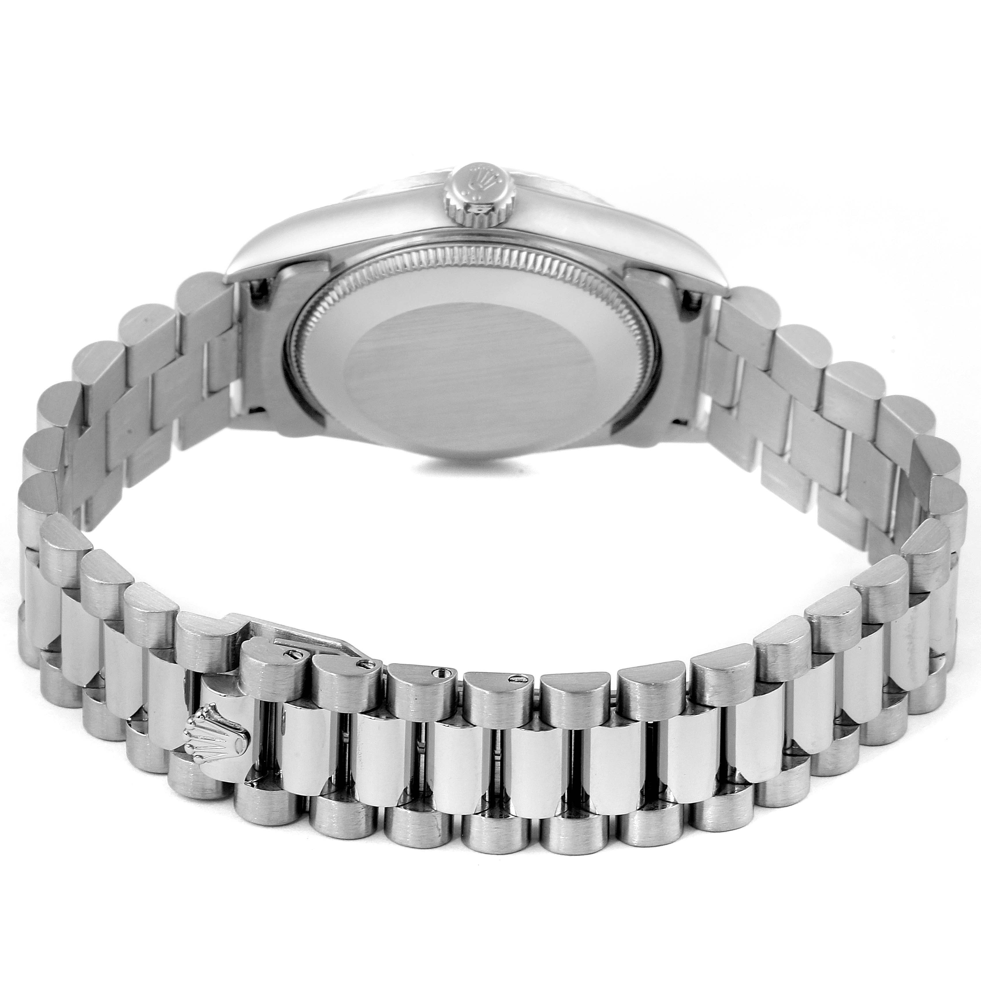 This image shows the back of a Rolex President 78279 Women's White Gold Silver Dial 78279 Women's White Gold Silver Dial watch, highlighting its case, screw-down crown, and iconic bracelet.