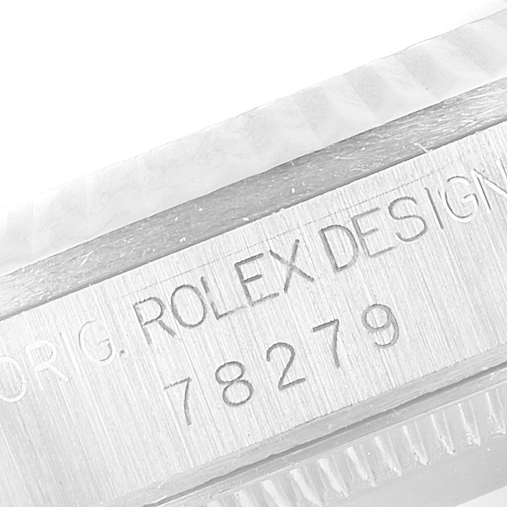 This close-up image shows the engraved model number "78279" on the case of a Rolex President 78279 Women's White Gold Silver Dial 78279 Women's White Gold Silver Dial watch.
