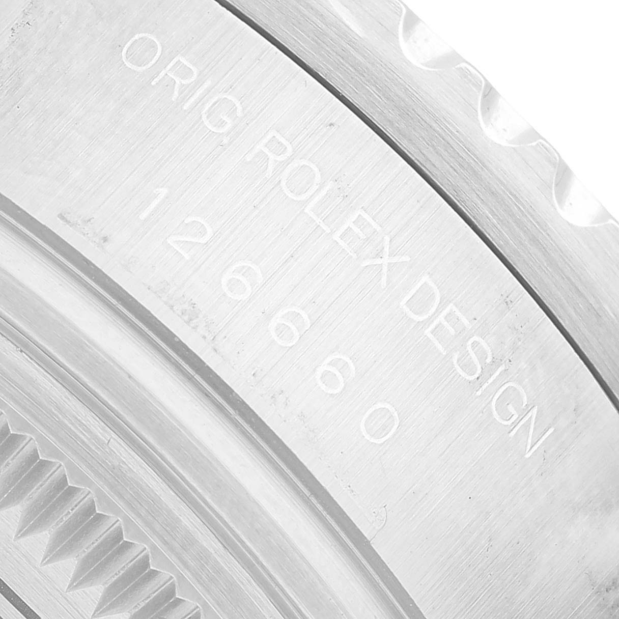 The image shows a close-up of the engraved case back on the Rolex Sea-Dweller 126660 Men's Stainless Steel Black Dial, highlighting the model number 126660.