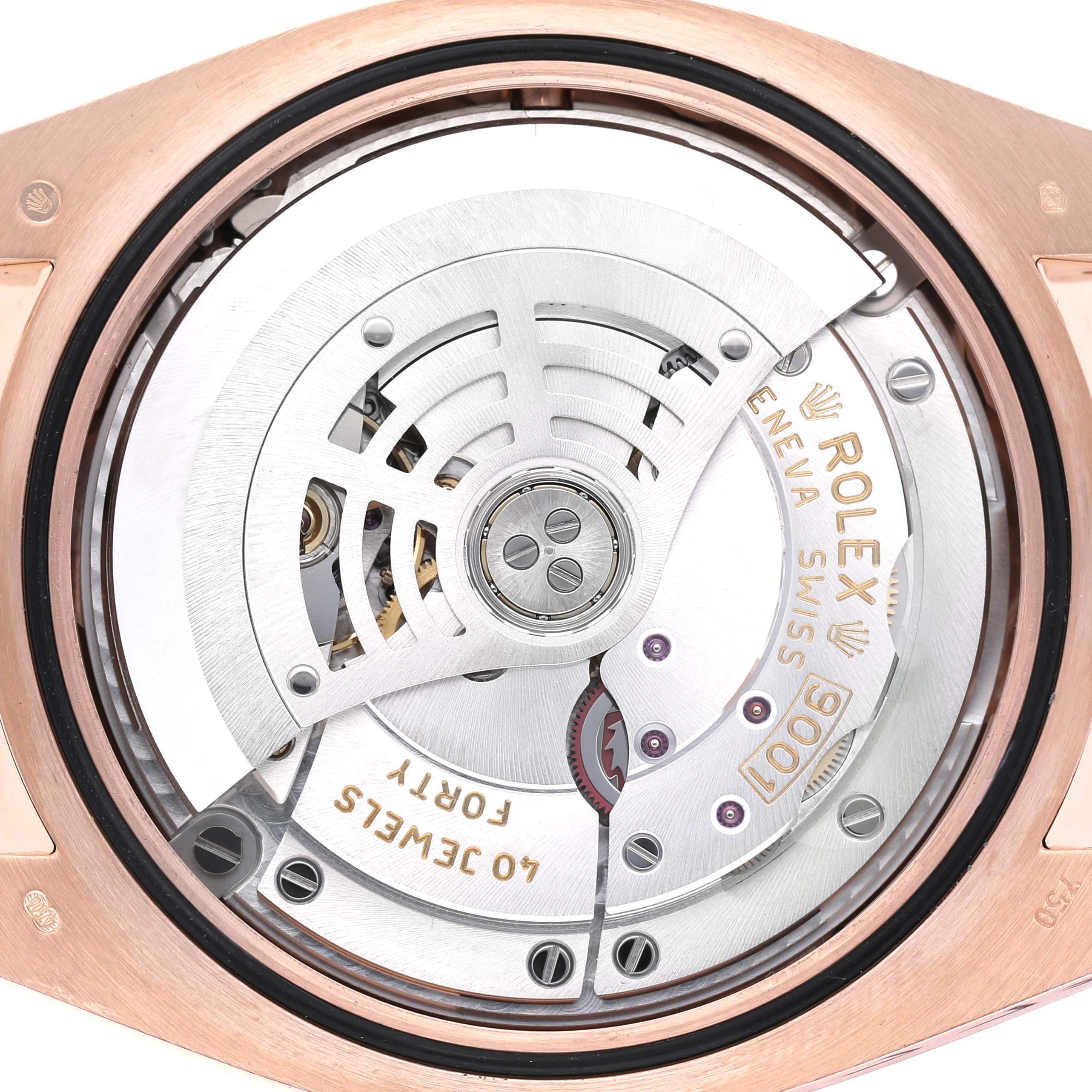 The image shows the back view of a Rolex Sky-Dweller 326135 Men's Rose Gold Brown Dial, highlighting its intricate movement and rotor mechanism.