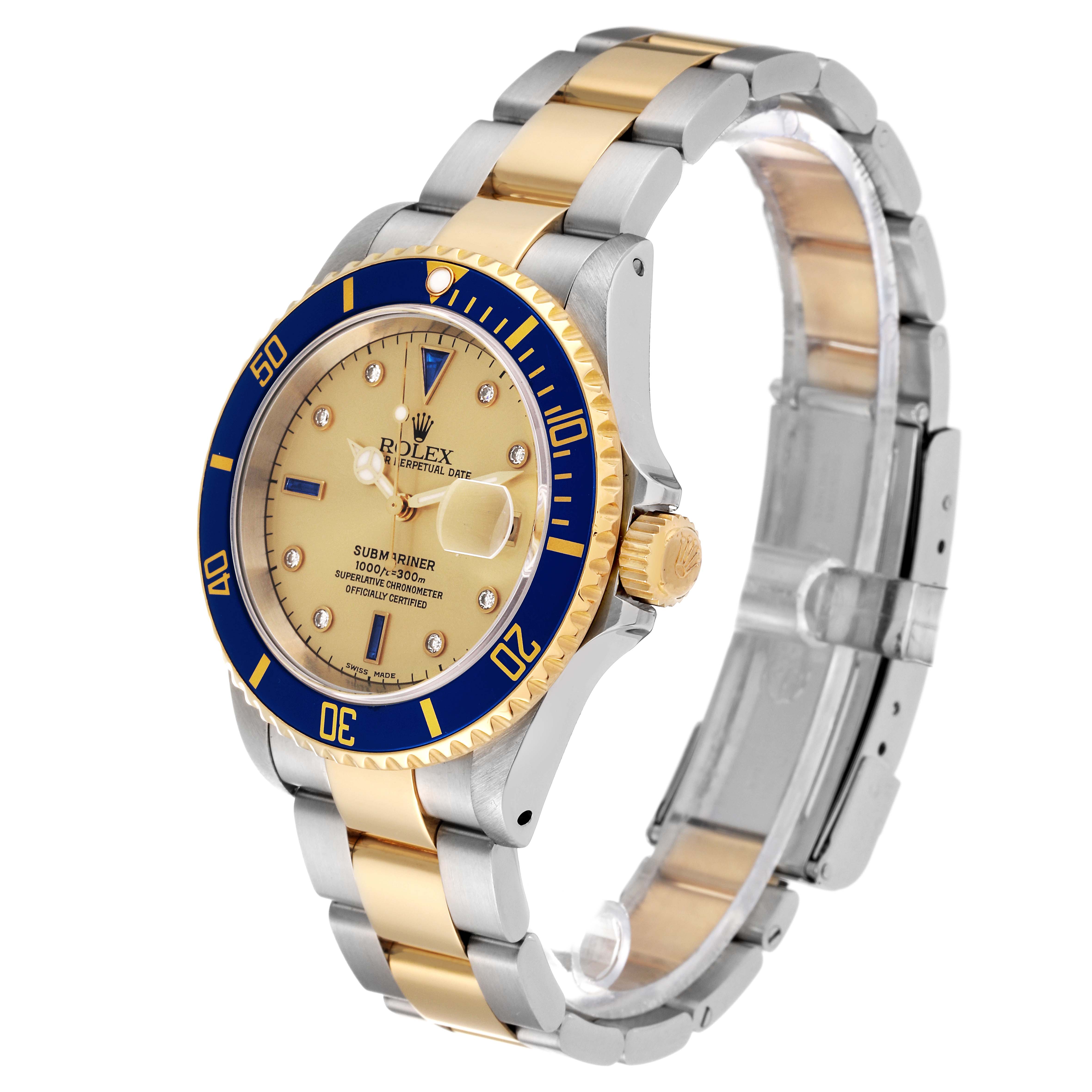 The image shows a Rolex Submariner 16613LB Men's Steel and Gold (two tone) Champagne Dial 16613LB Men's Steel and Gold (two tone) Champagne Dial watch at a slight angle, highlighting its gold dial, blue bezel, and two-tone bracelet.