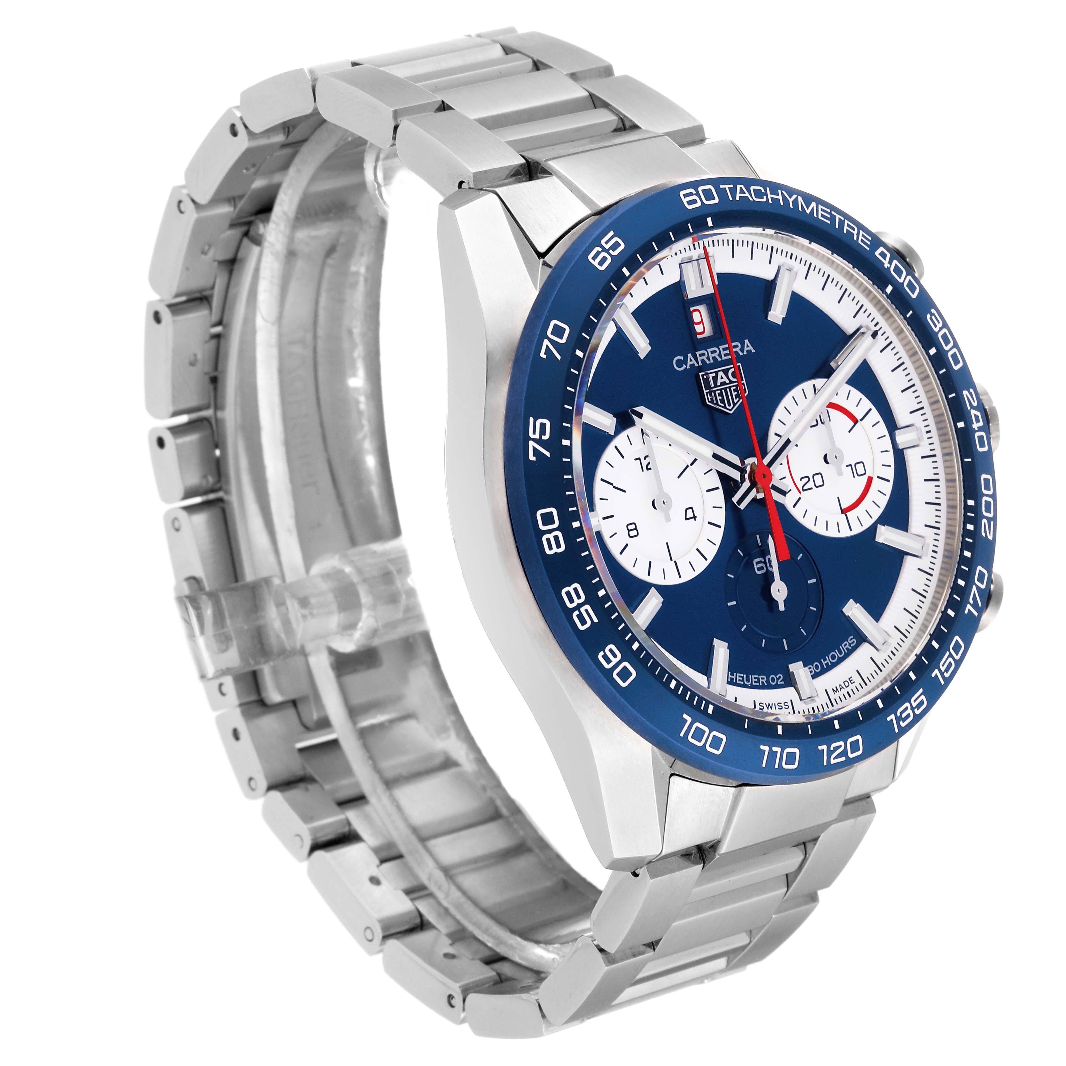The Tag Heuer Carrera CBN2A1E Men's Stainless Steel Blue Dial CBN2A1E Men's Stainless Steel Blue Dial watch is shown at a three-quarter angle, displaying its blue dial, tachymeter bezel, and stainless steel bracelet.