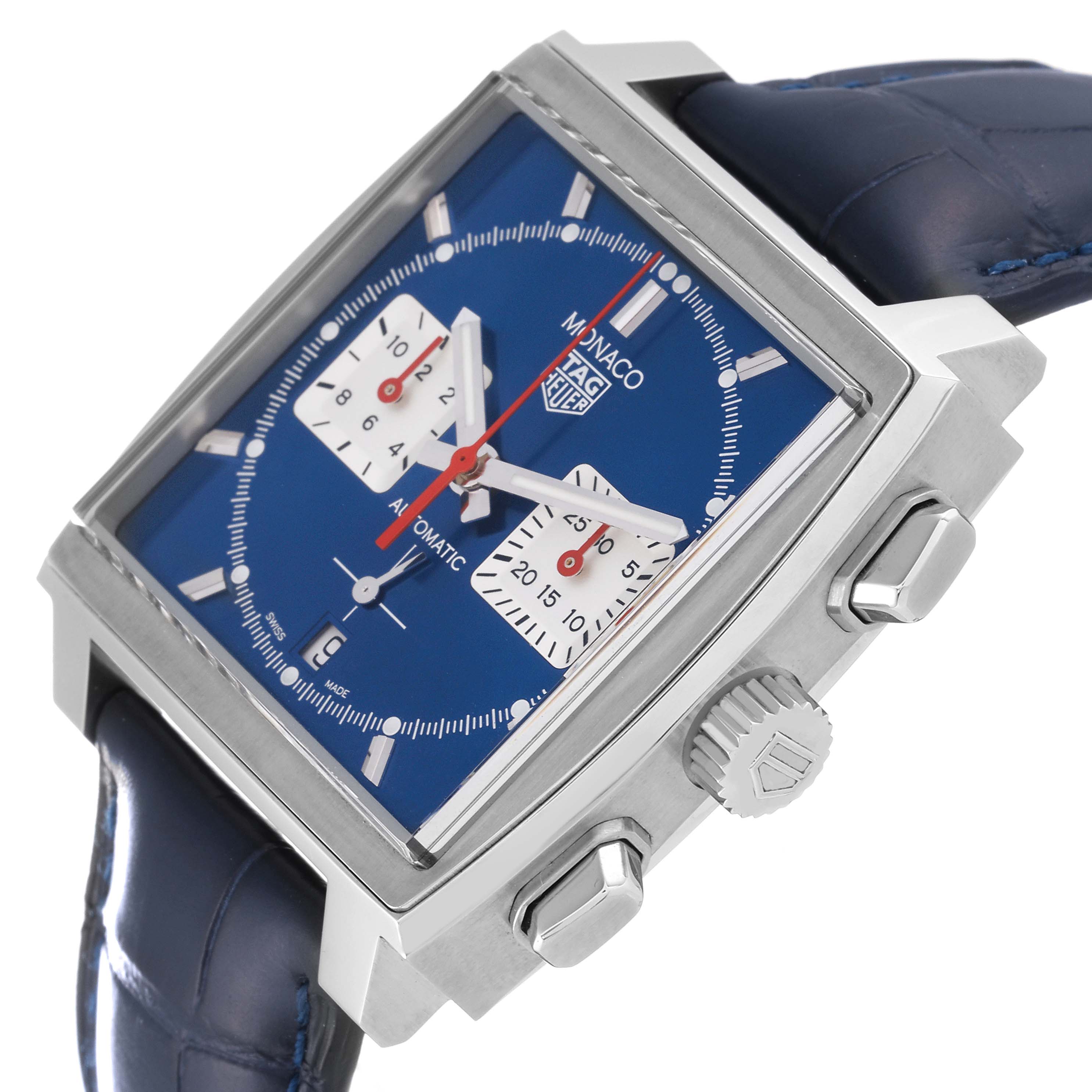 The image shows a detailed side view of a Tag Heuer Monaco CBL2111.FC6453 Men's Stainless Steel Blue Dial CBL2111.FC6453 Men's Stainless Steel Blue Dial watch, highlighting the blue dial, crown, buttons, and strap.