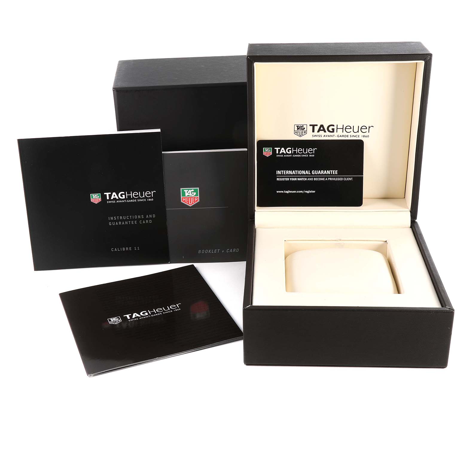 The image shows the Tag Heuer Limited Edition CAW211C.FC6241 Men
s Stainless Steel Silver Dial CAW211C.FC6241 Men
s Stainless Steel Silver Dial watch packaging, including the box, manual, and guarantee card from a straight-on angle.
