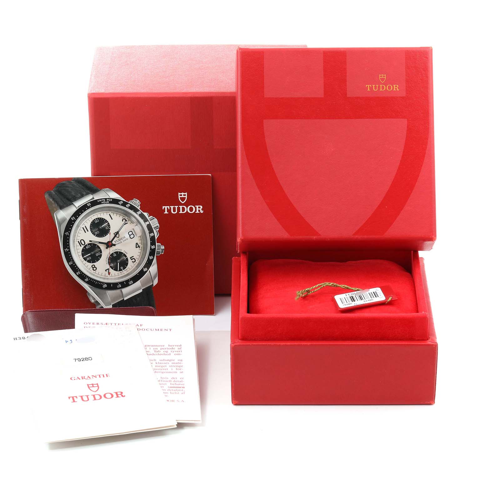 The image shows the Tudor Tiger 79280 Men's Stainless Steel Silver Dial 79280 Men's Stainless Steel Silver Dial model watch packaging, including the box, manuals, and a warranty card.