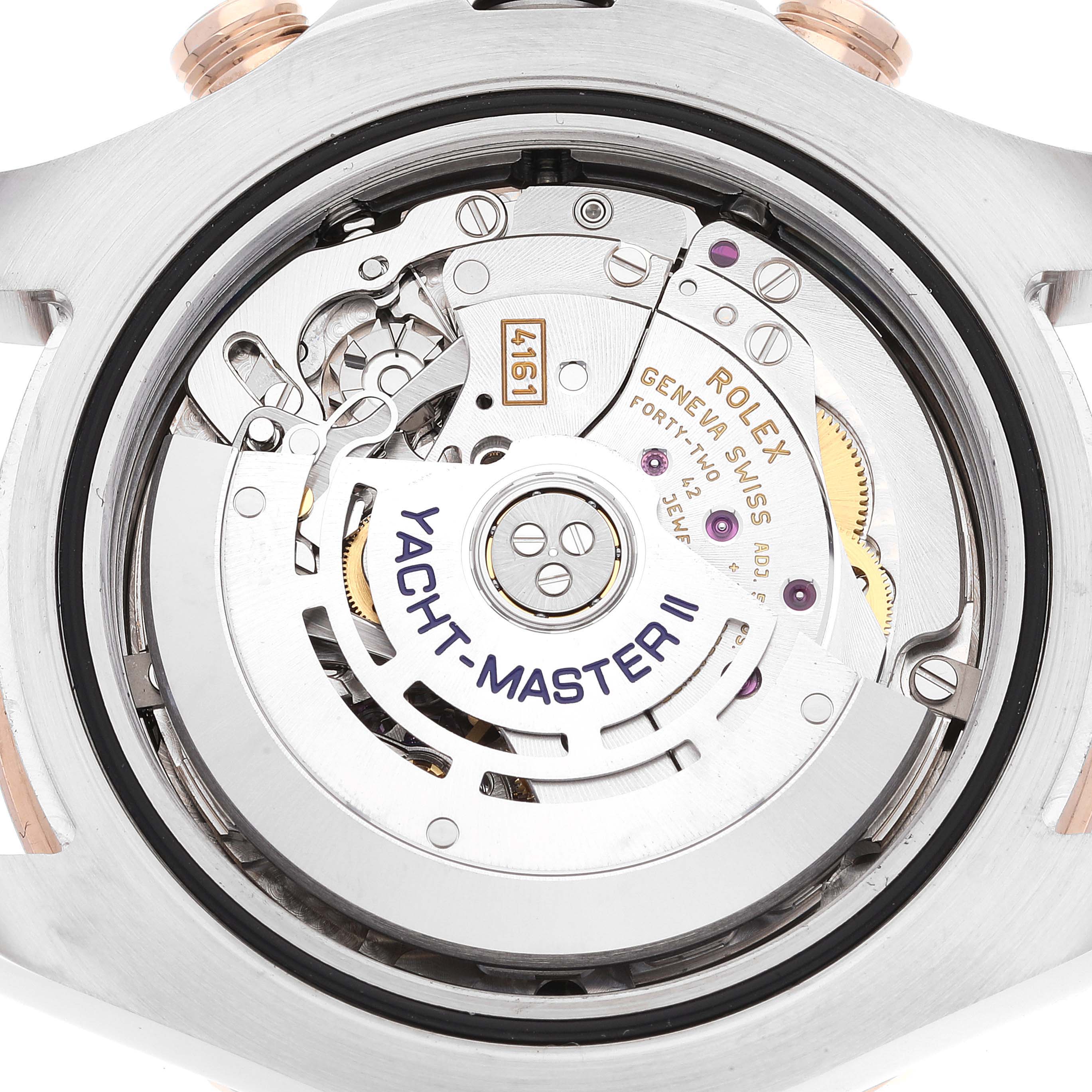 The image shows an open back view of the Rolex Yacht-Master 116681 Men
s Steel and Gold (two tone) White Dial 116681 Men
s Steel and Gold (two tone) White Dial II watch, revealing its intricate internal movement.
