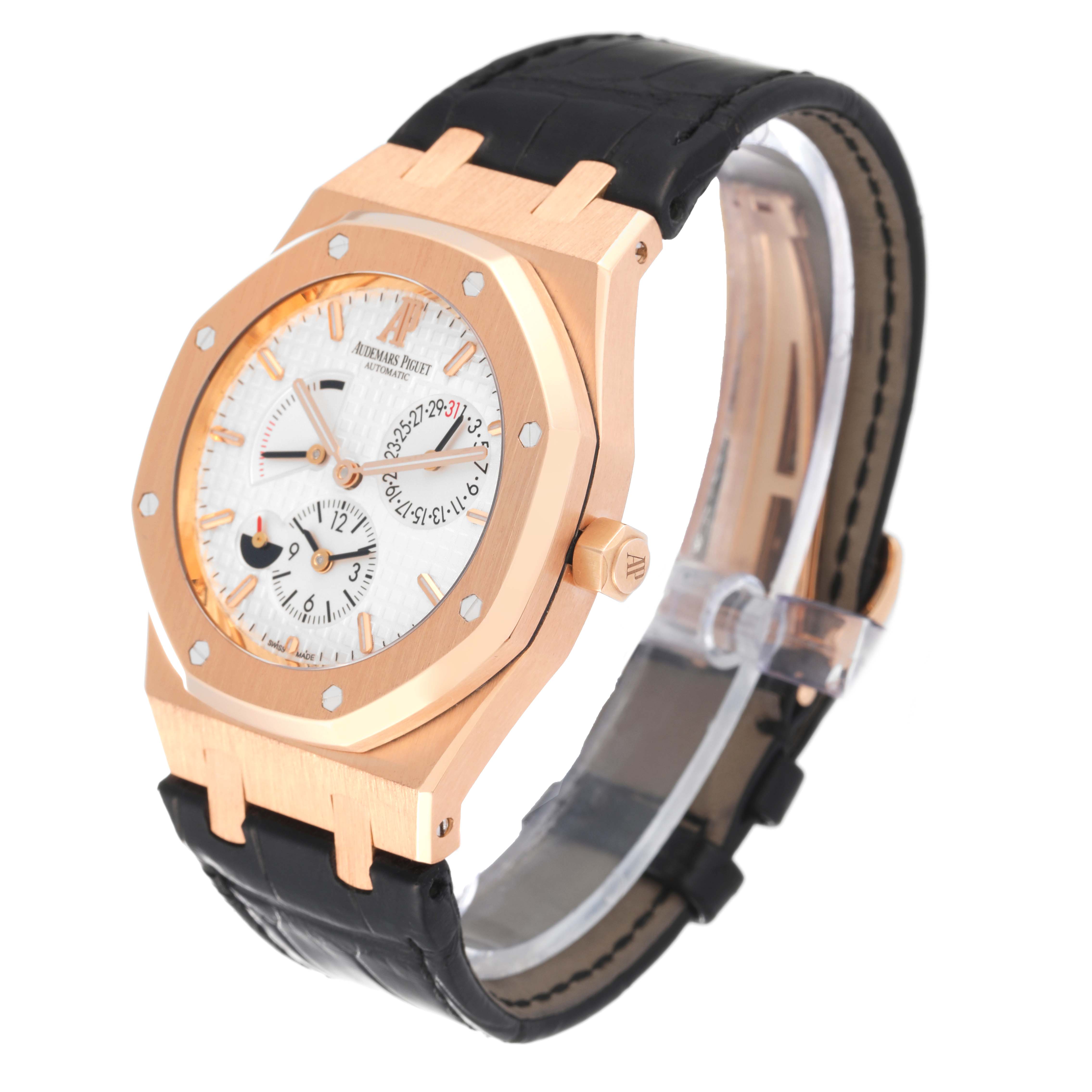 This image shows a Royal Oak by Audemars Piguet at a slight angle, highlighting the face, bezel, and leather strap.