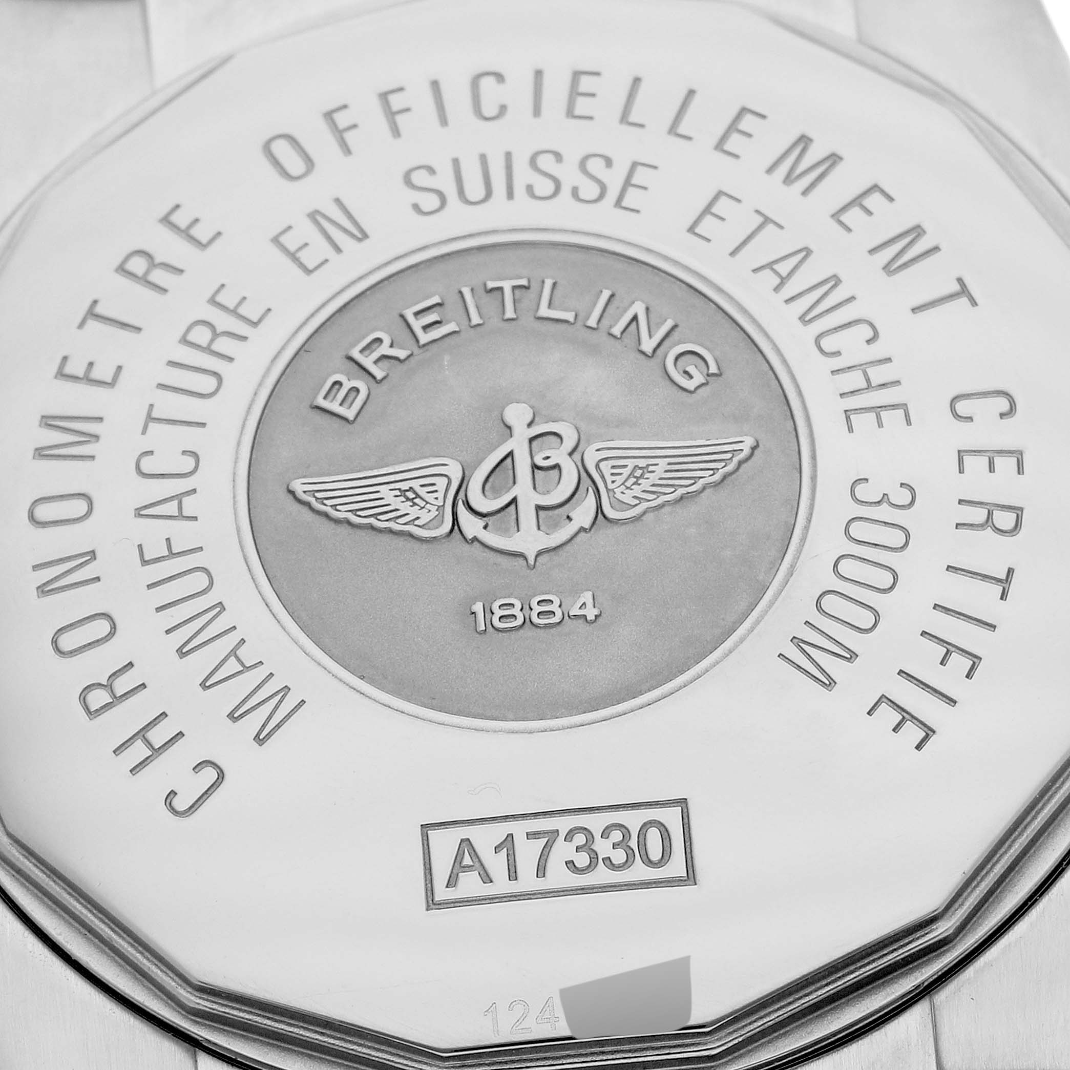 The image shows the caseback of a Breitling Avenger A17330 Men's Stainless Steel Black Dial A17330 Men's Stainless Steel Black Dial model, displaying branding and certification details.