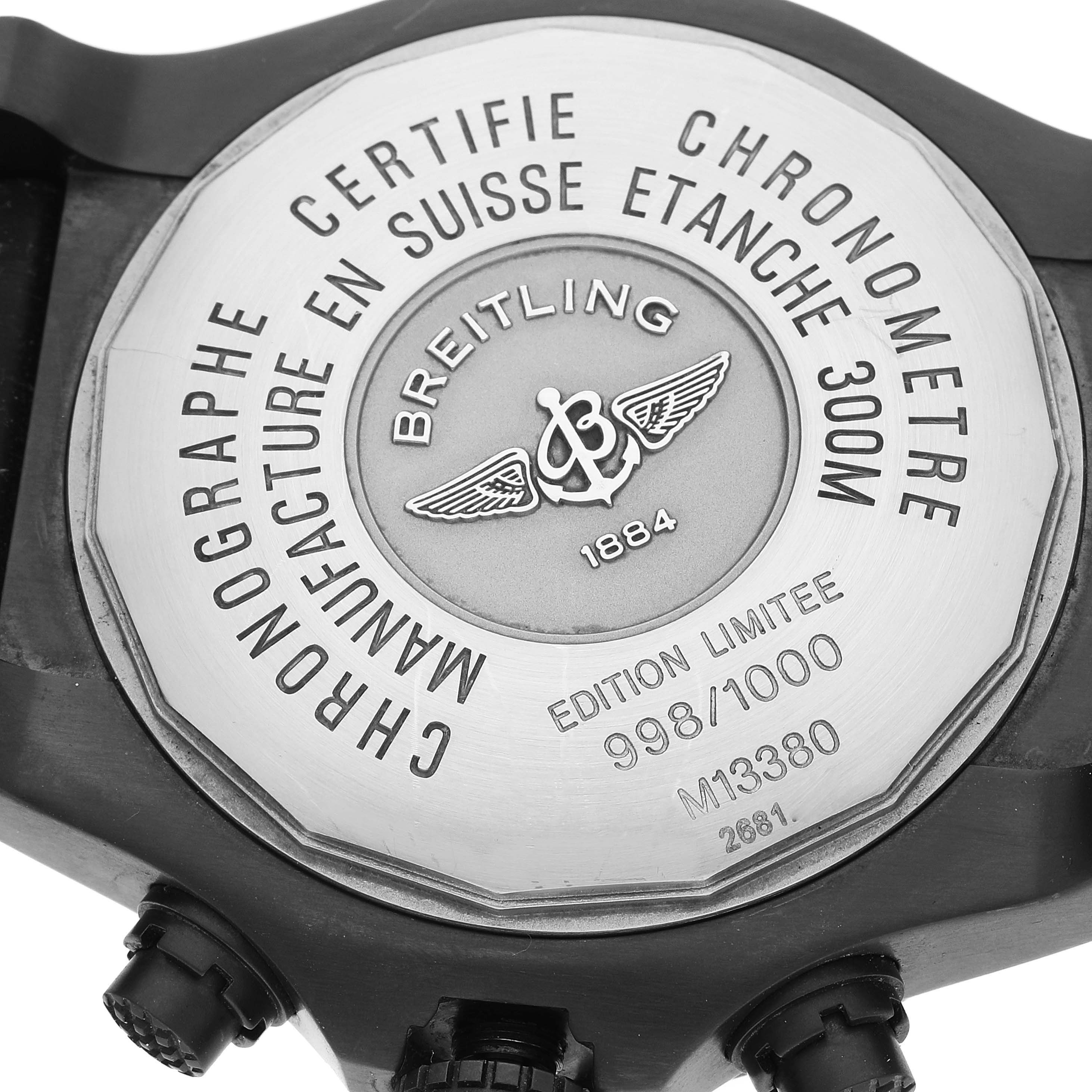 This image displays the back case of a Breitling Avenger M13380 Men's Stainless Steel Black Dial M13380 Men's Stainless Steel Black Dial watch, showcasing various engravings and serial numbers.