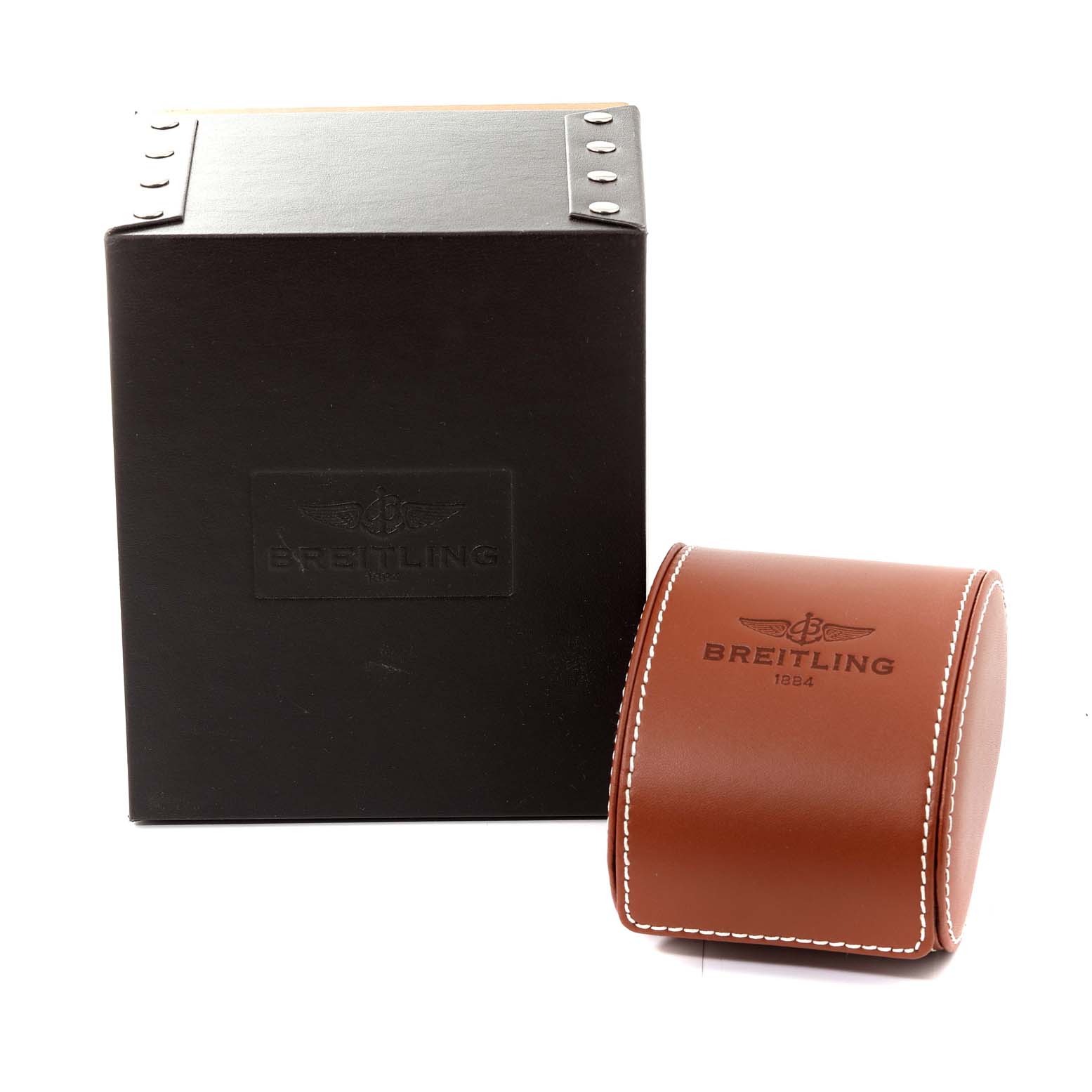 The image shows the packaging for a Breitling Avenger M13380 men's watch, including a black box and a brown leather watch case with white stitching.