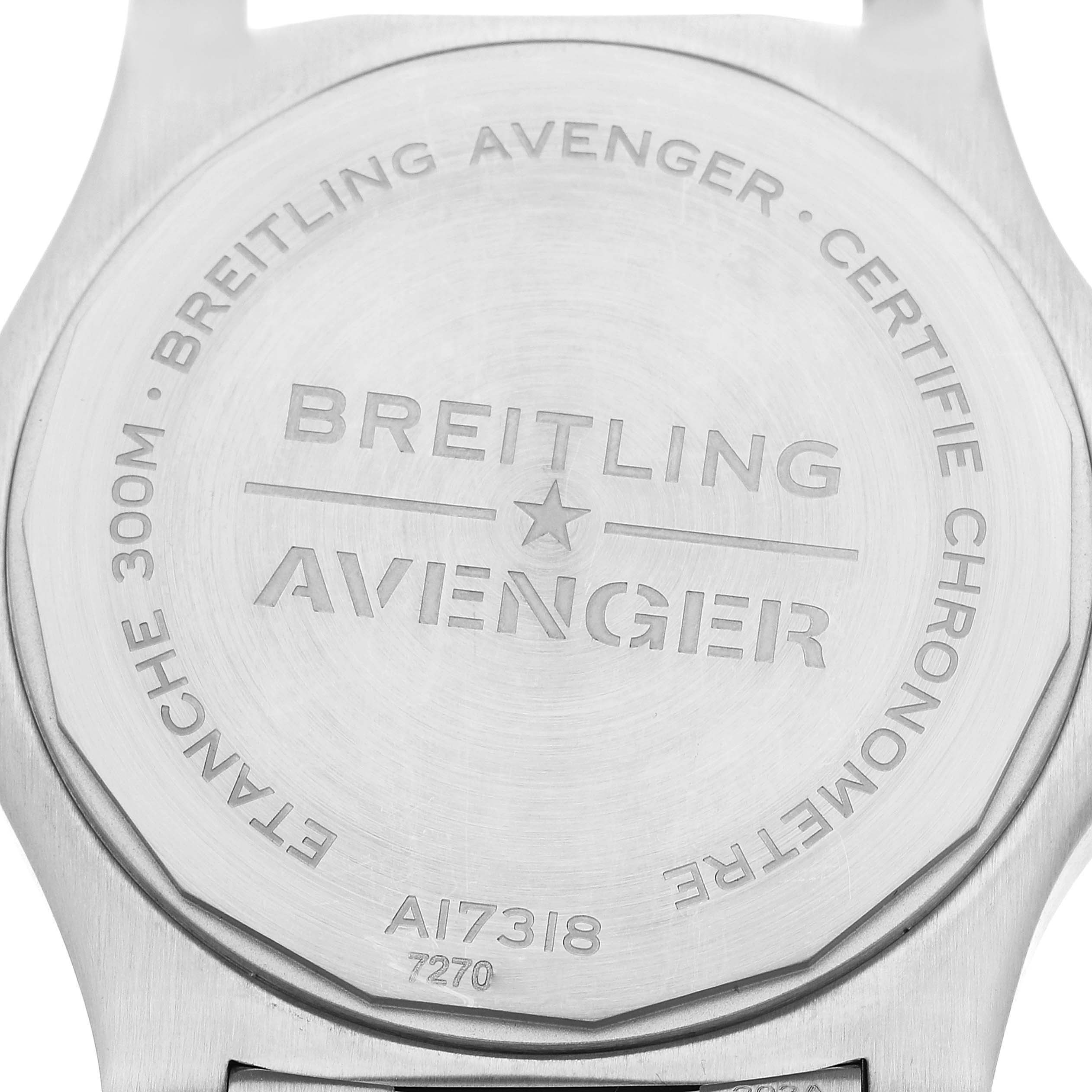 The image shows the back case of a Breitling Avenger A17318 Men's Stainless Steel Blue Dial A17318 Men's Stainless Steel Blue Dial watch, featuring engraved branding and model details.