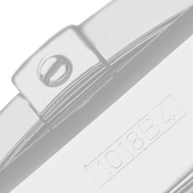 The image shows a close-up of the backside of the Breitling Limited Series watch, highlighting the serial number and part of the clasp.