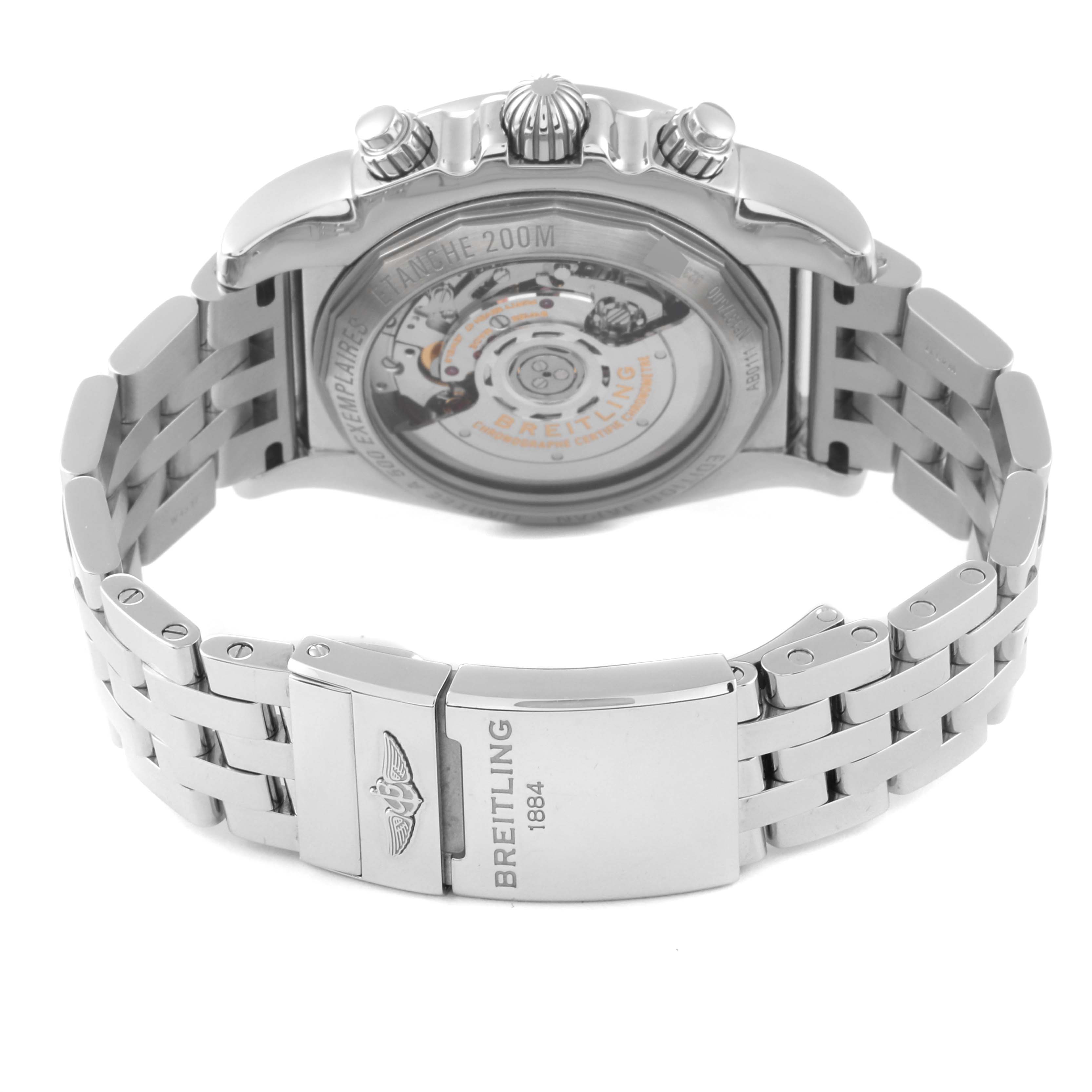 The image shows the back and clasp of the Breitling Limited Series watch, highlighting the transparent case back and metal bracelet.