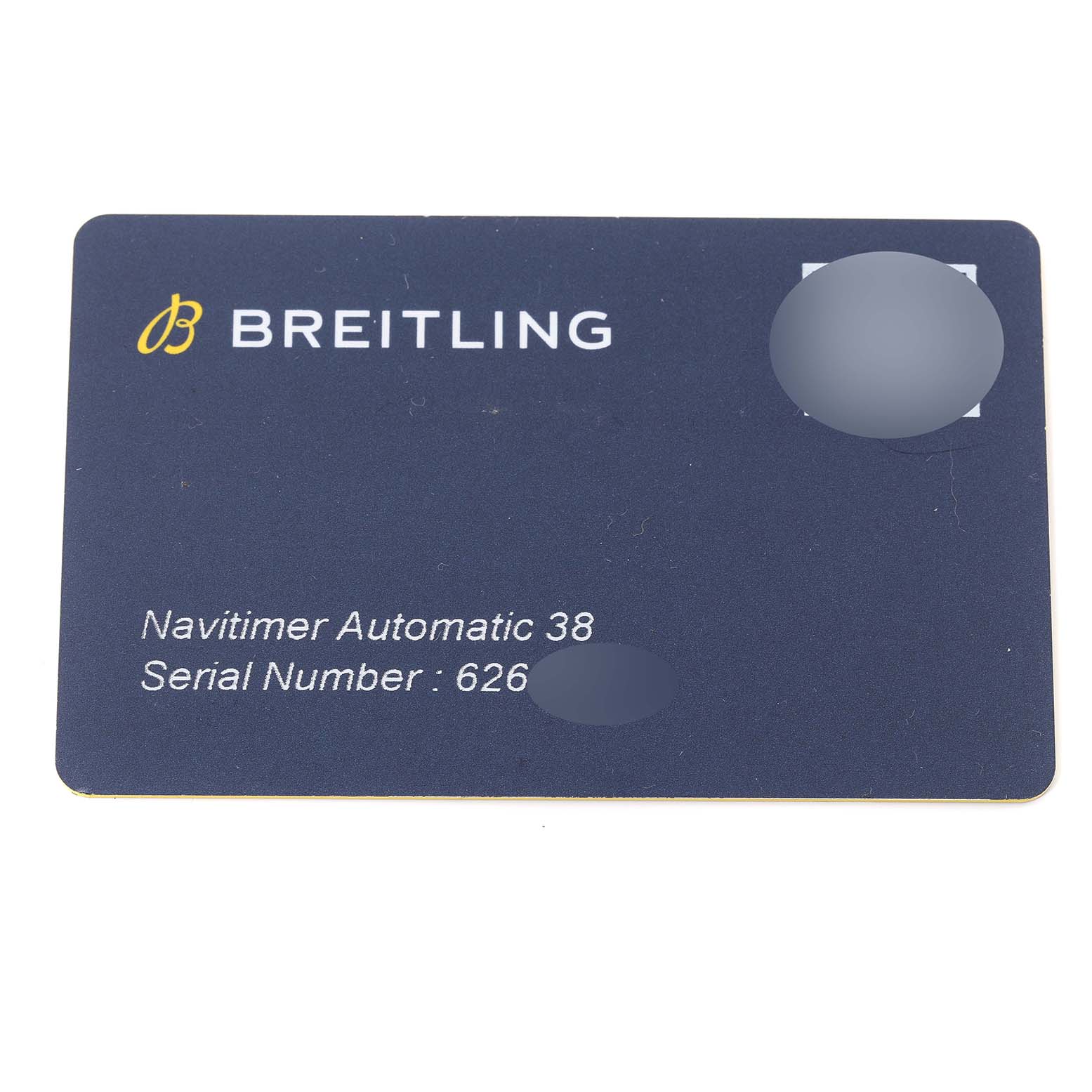 The image shows a warranty card for a Breitling Navitimer A17325 Men's Stainless Steel Black Dial A17325 Men's Stainless Steel Black Dial Automatic 38, displaying the brand, model, and serial number.