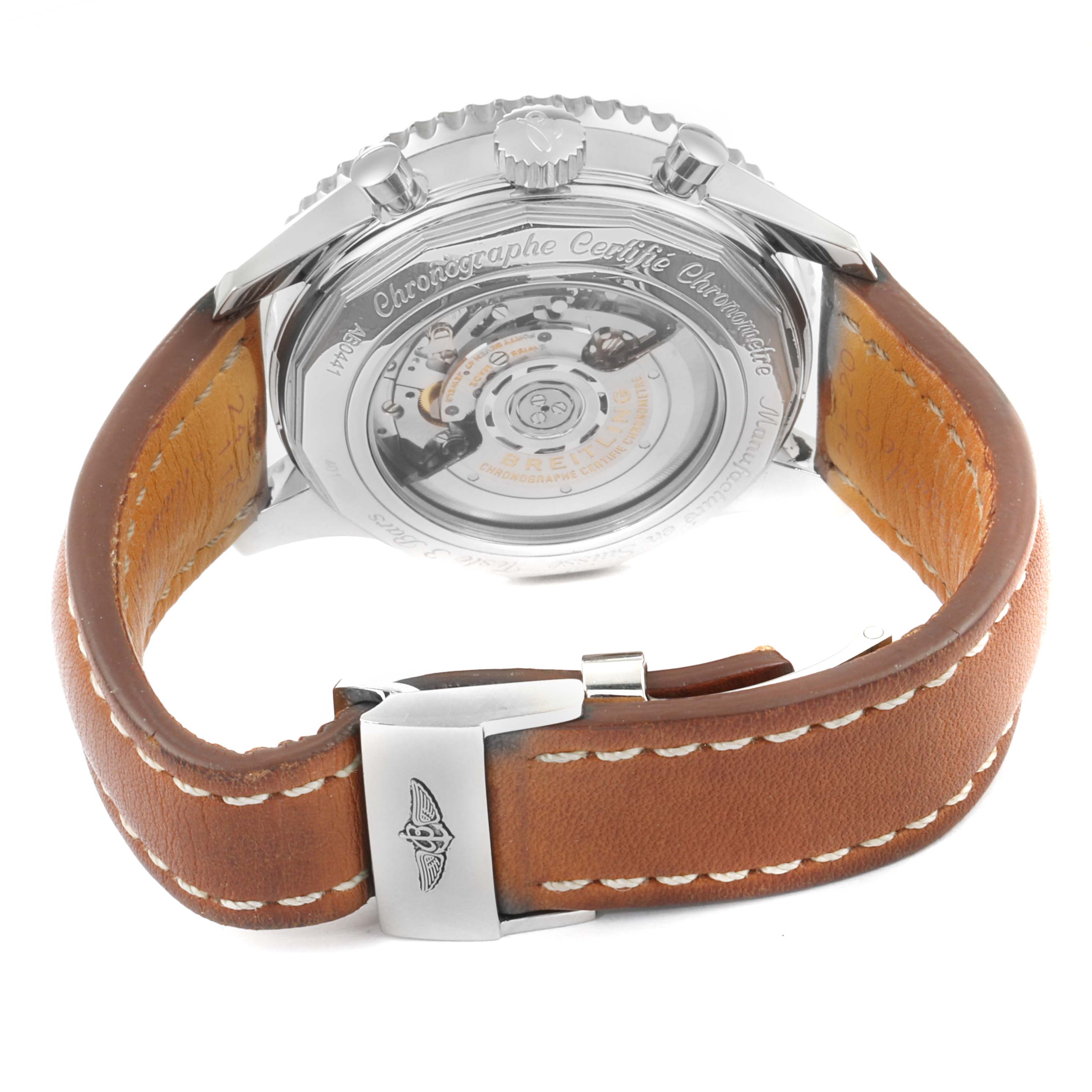 The image shows a rear view of the Breitling Navitimer AB044121-G783-453A Men's Stainless Steel Silver Dial AB044121-G783-453A Men's Stainless Steel Silver Dial watch with a display of its mechanical movement and the leather strap's buckle.