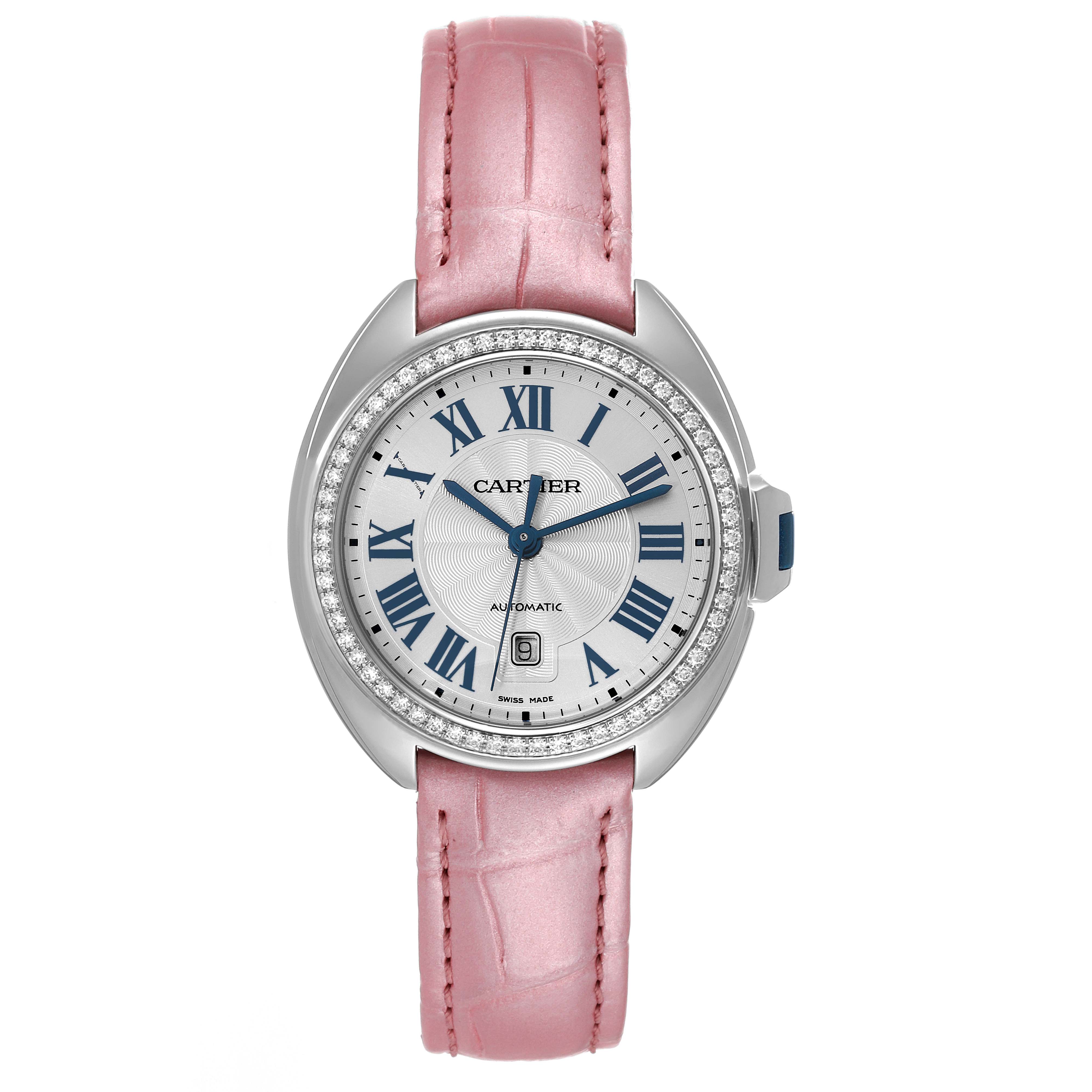 The Cartier Cle W4CL0005 Women's Stainless Steel Blue Dial W4CL0005 Women's Stainless Steel Blue Dial model watch is shown from the front, displaying its pink leather strap, Roman numeral dial, and diamond bezel.