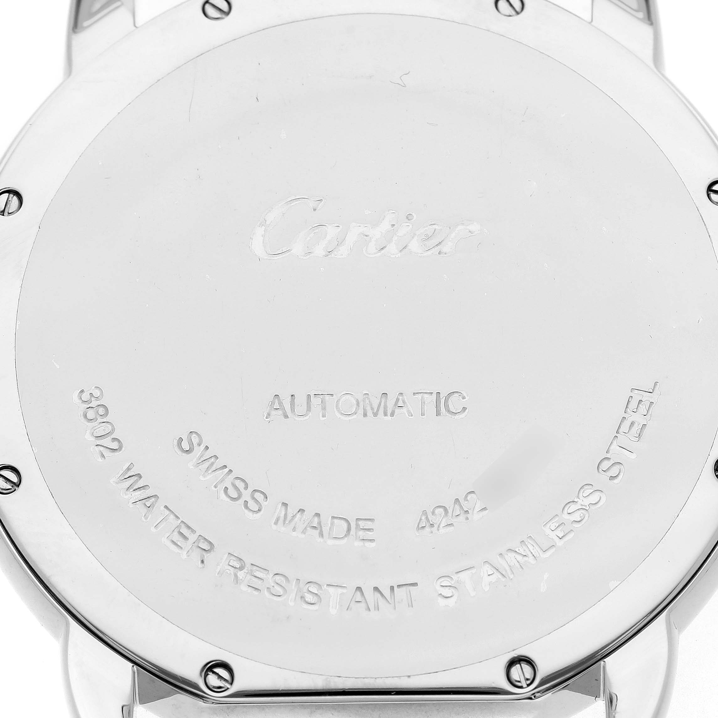 The image shows the back of a Cartier Ronde WSRN0023 Men's Stainless Steel Blue Dial watch, displaying engravings including branding and model details.