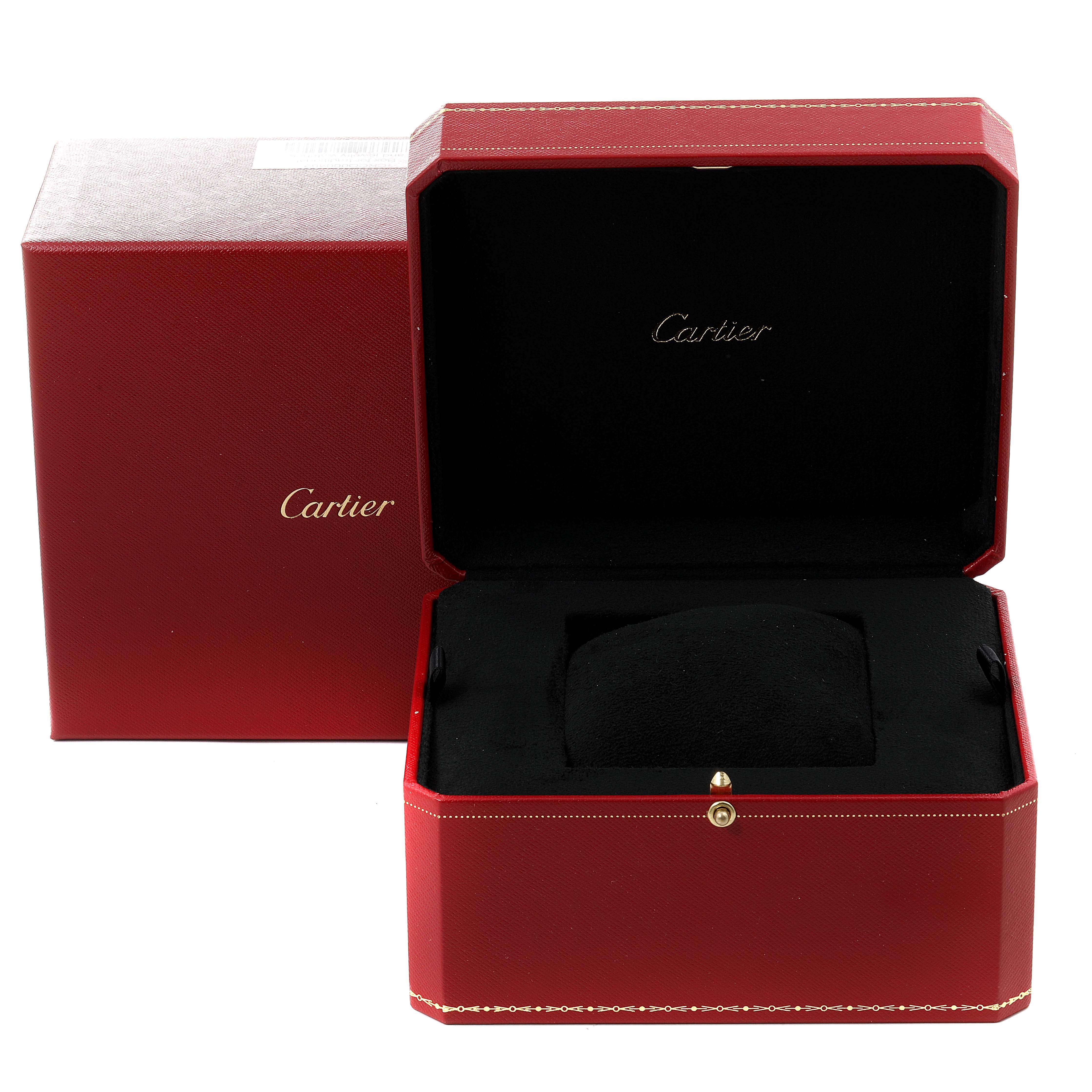 The image shows a red Cartier box for the Tank Americaine watch, open to reveal its interior.