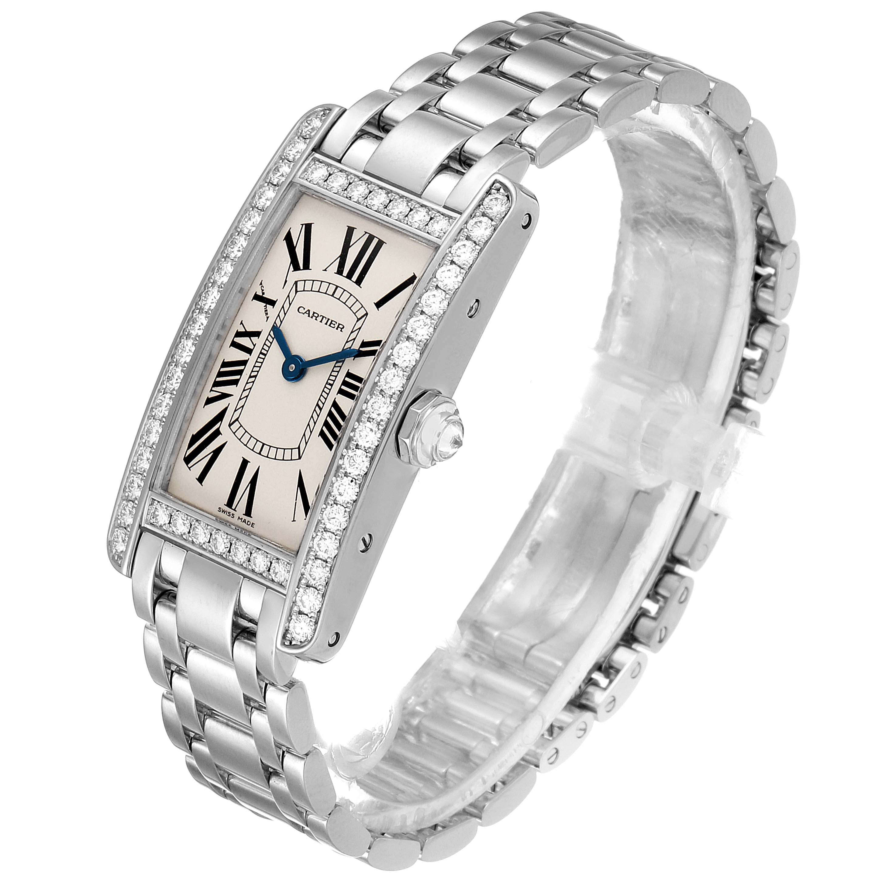 The image shows an angled top view focused on the face and bracelet of the Cartier Tank Americaine WB7073L1 Women's White Gold Silver Dial WB7073L1 Women's White Gold Silver Dial watch.