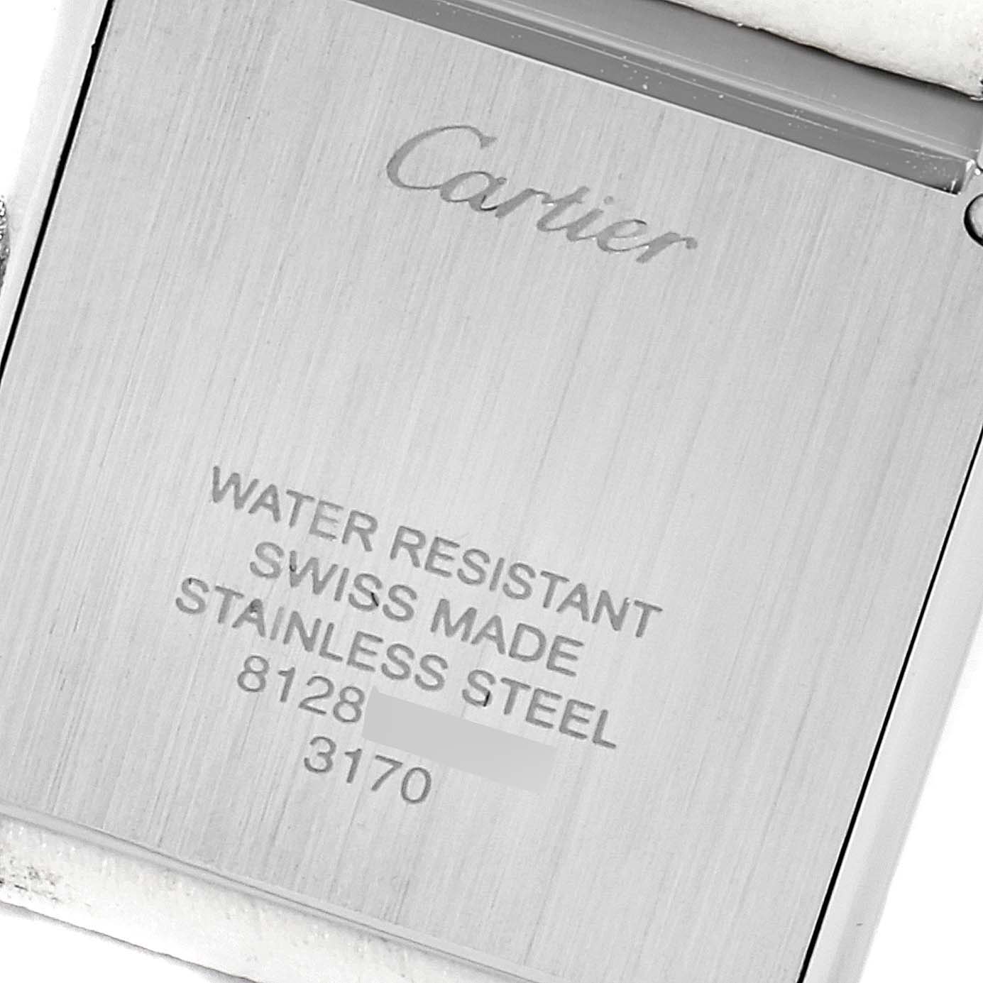 This image shows the back of the Cartier Tank Solo W1018255 Women's Stainless Steel Silver Dial W1018255 Women's Stainless Steel Silver Dial watch, highlighting its engravings and stainless steel material.