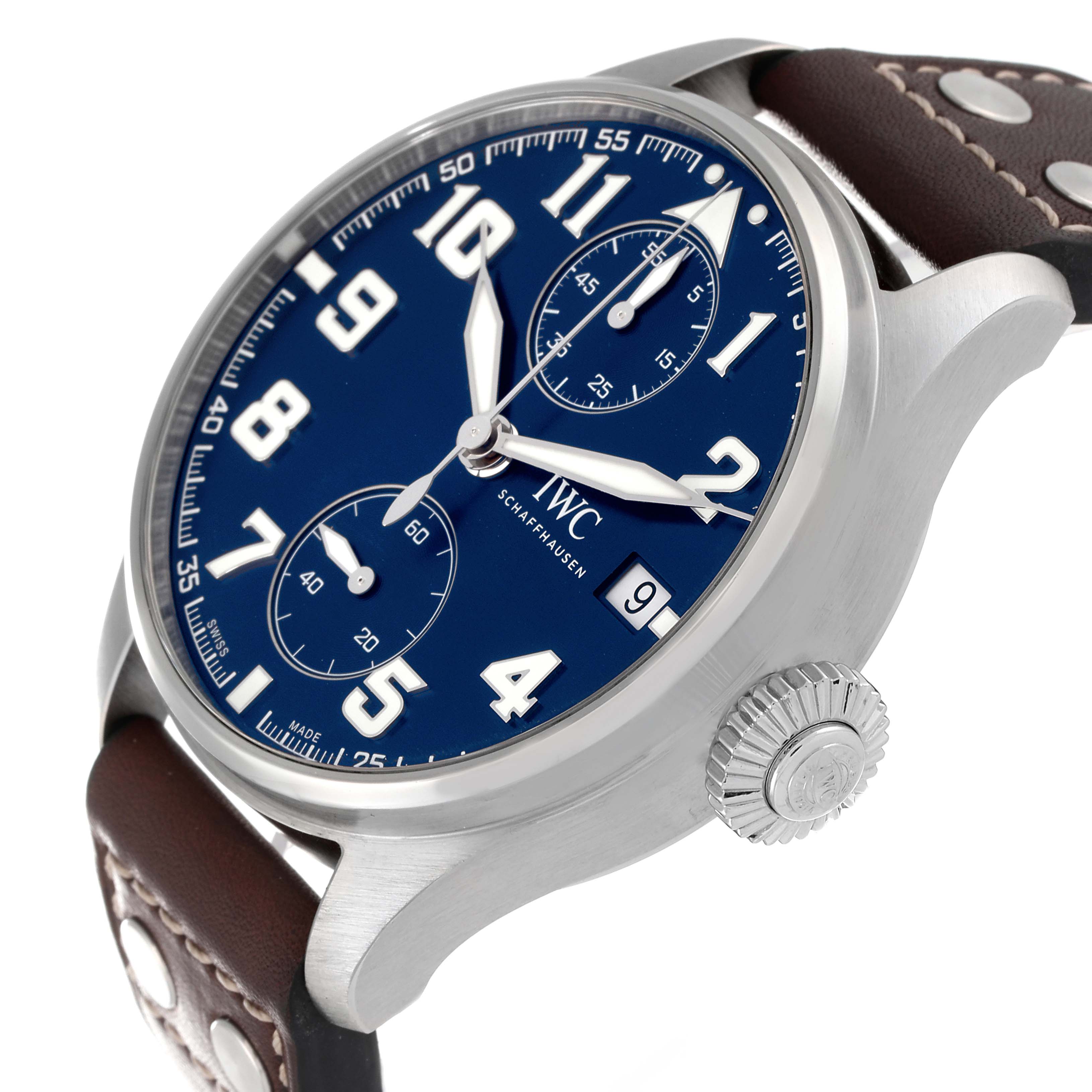The image shows an angled view of an IWC Pilot IW515202 Men's Stainless Steel Blue Dial IW515202 Men's Stainless Steel Blue Dial watch featuring the crown, dial, subdials, and leather strap.
