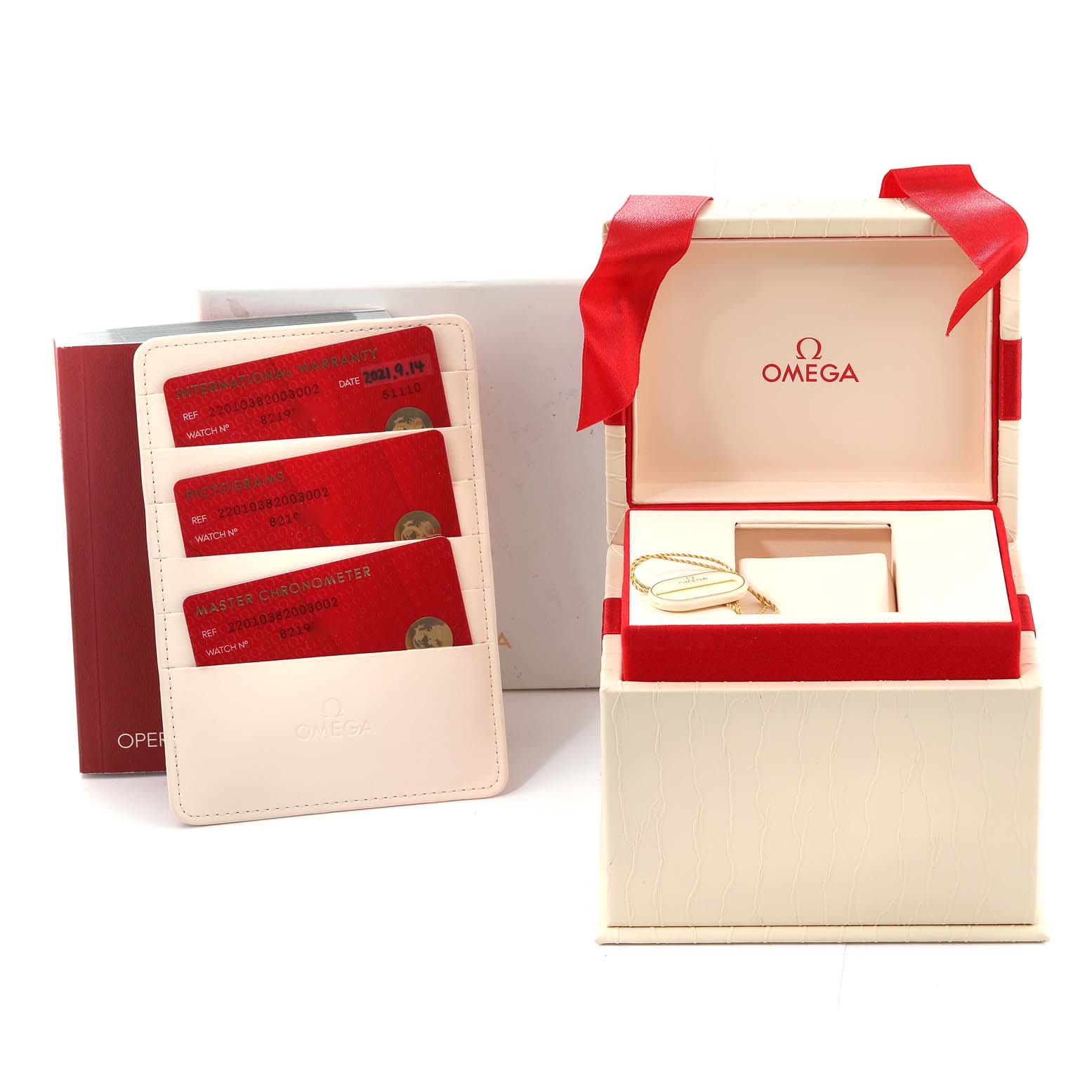 The image shows the packaging, warranty cards, and accessories of an Omega Aqua Terra 220.10.38.20.03.002 Men's Stainless Steel Blue Dial 220.10.38.20.03.002 Men's Stainless Steel Blue Dial watch from a front-side angle.