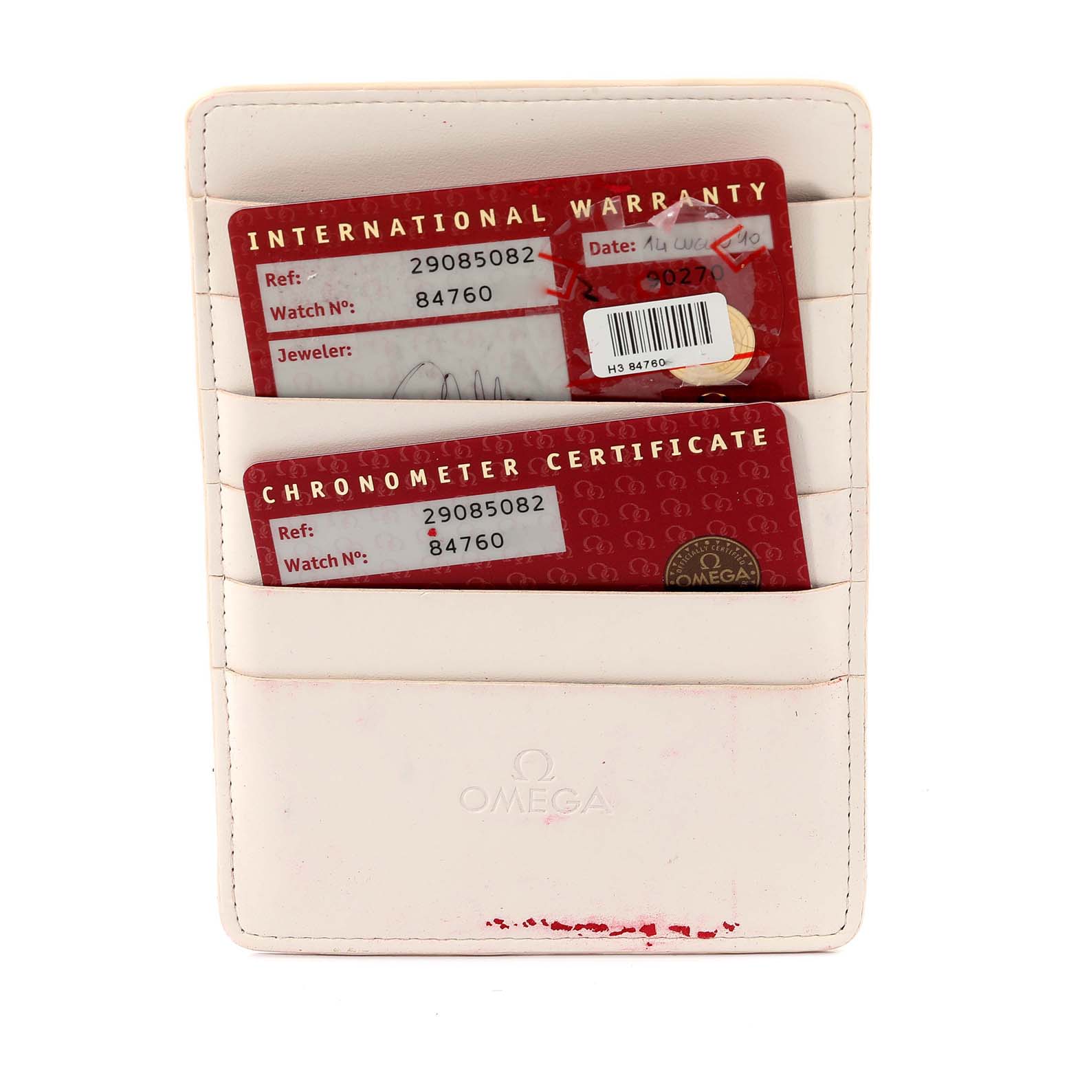 The image shows an Omega Planet Ocean 2908.50.82 Men
s Stainless Steel Black Dial 2908.50.82 Men
s Stainless Steel Black Dial watch
s international warranty and chronometer certificate cards in a white cardholder.