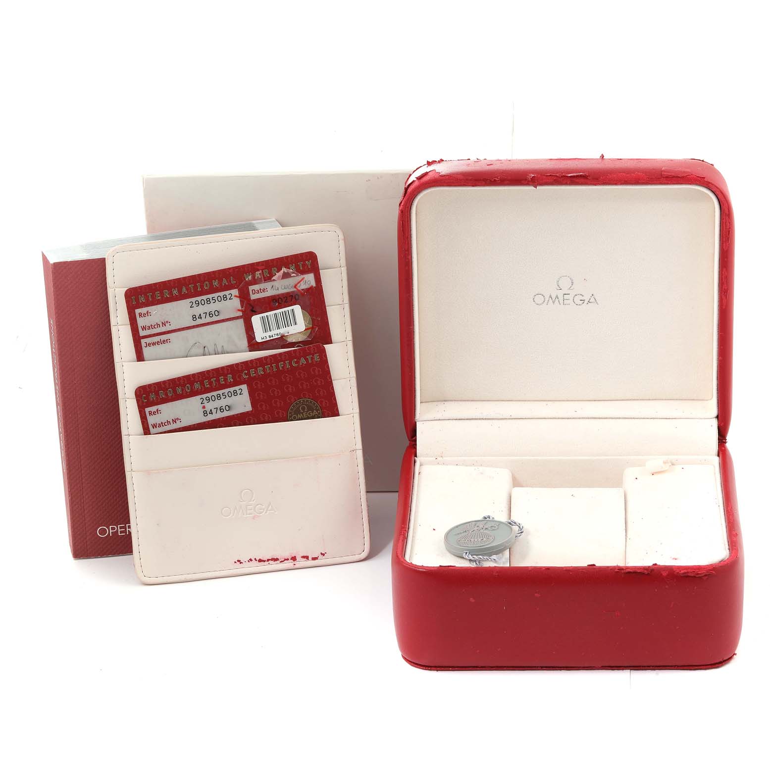 The image shows the Planet Ocean model by Omega, featuring its watch box, certificates, and a manual in a semi-open angle.