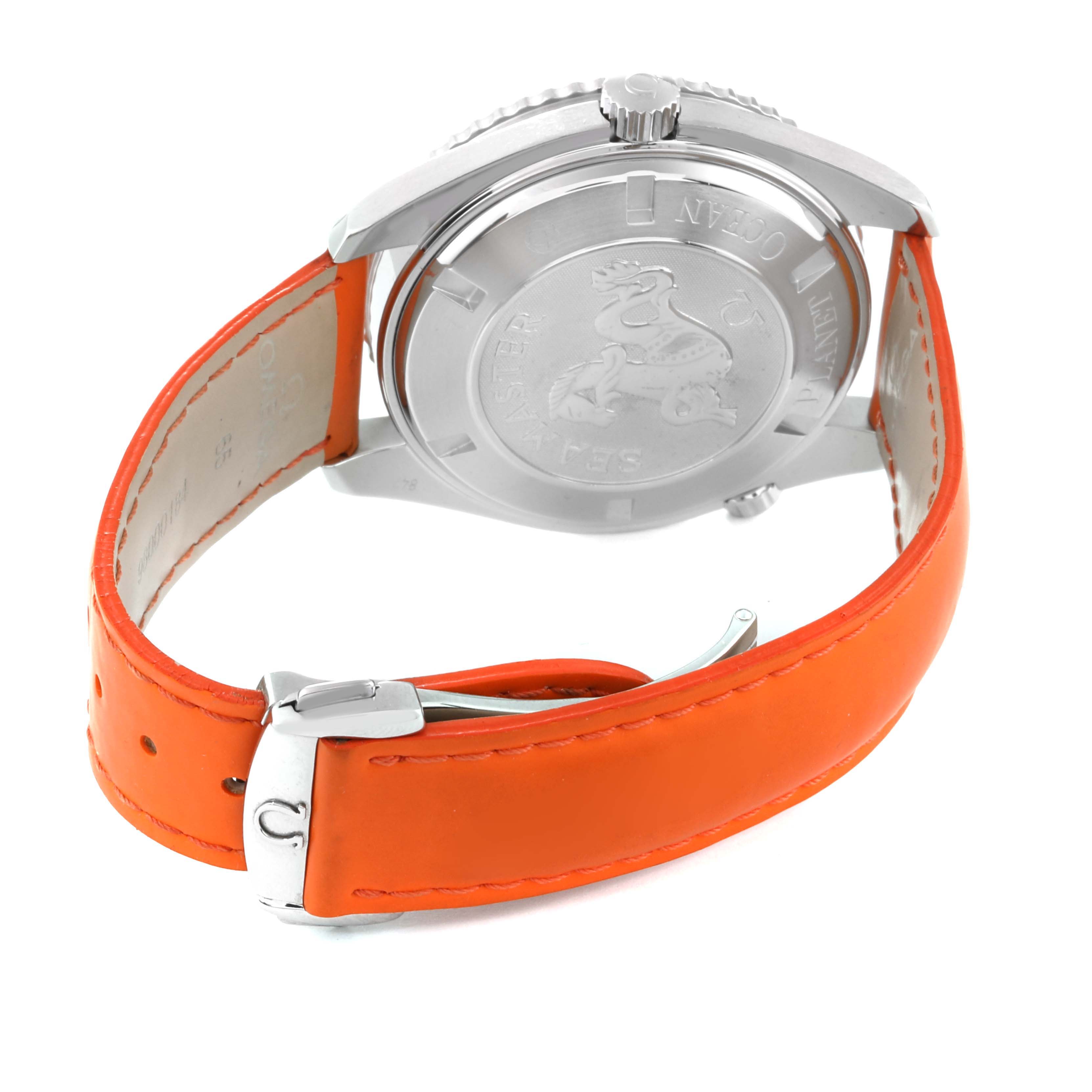 The image shows the back and side of an Omega Planet Ocean 2908.50.82 Men
s Stainless Steel Black Dial 2908.50.82 Men
s Stainless Steel Black Dial watch with an orange strap and a closed clasp.