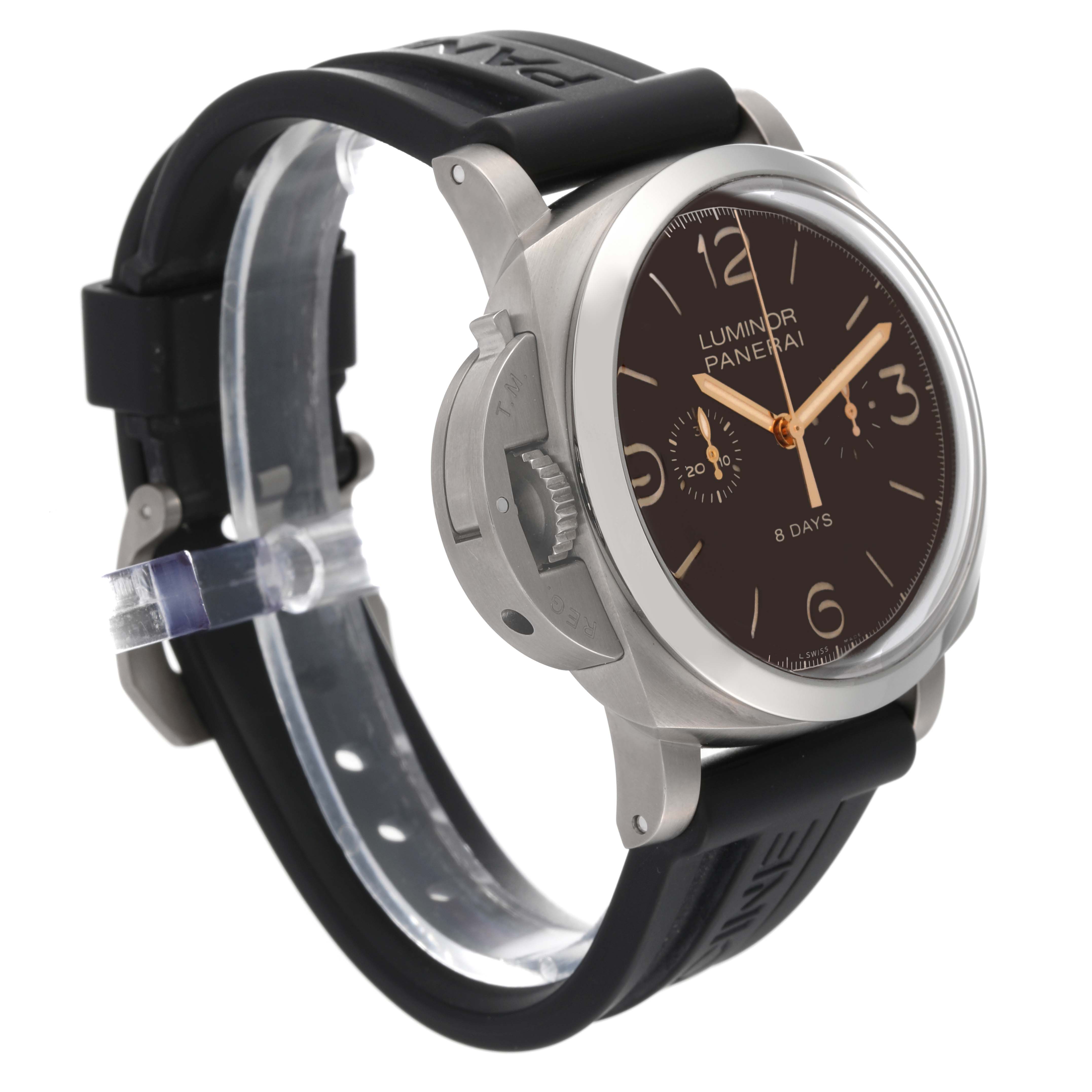 The image shows a Panerai Luminor PAM00579 Men's Titanium Brown Dial PAM00579 Men's Titanium Brown Dial model watch from a side angle, highlighting its case, dial, crown guard, and black rubber strap.