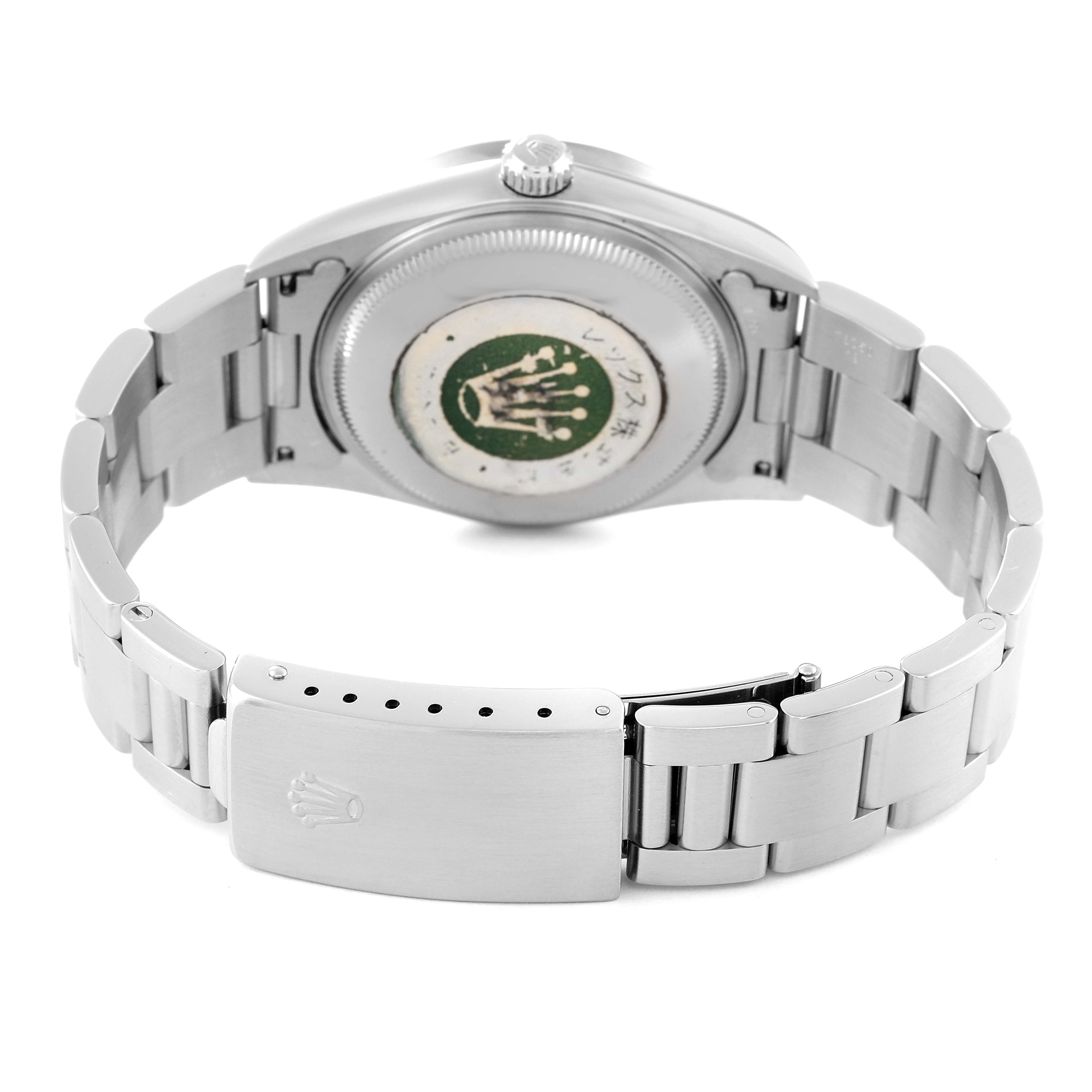 The image shows the back view of a Rolex Air-King 14010 Men's Stainless Steel Pink Dial 14010 Men's Stainless Steel Pink Dial watch, featuring the case back, bracelet, and clasp.