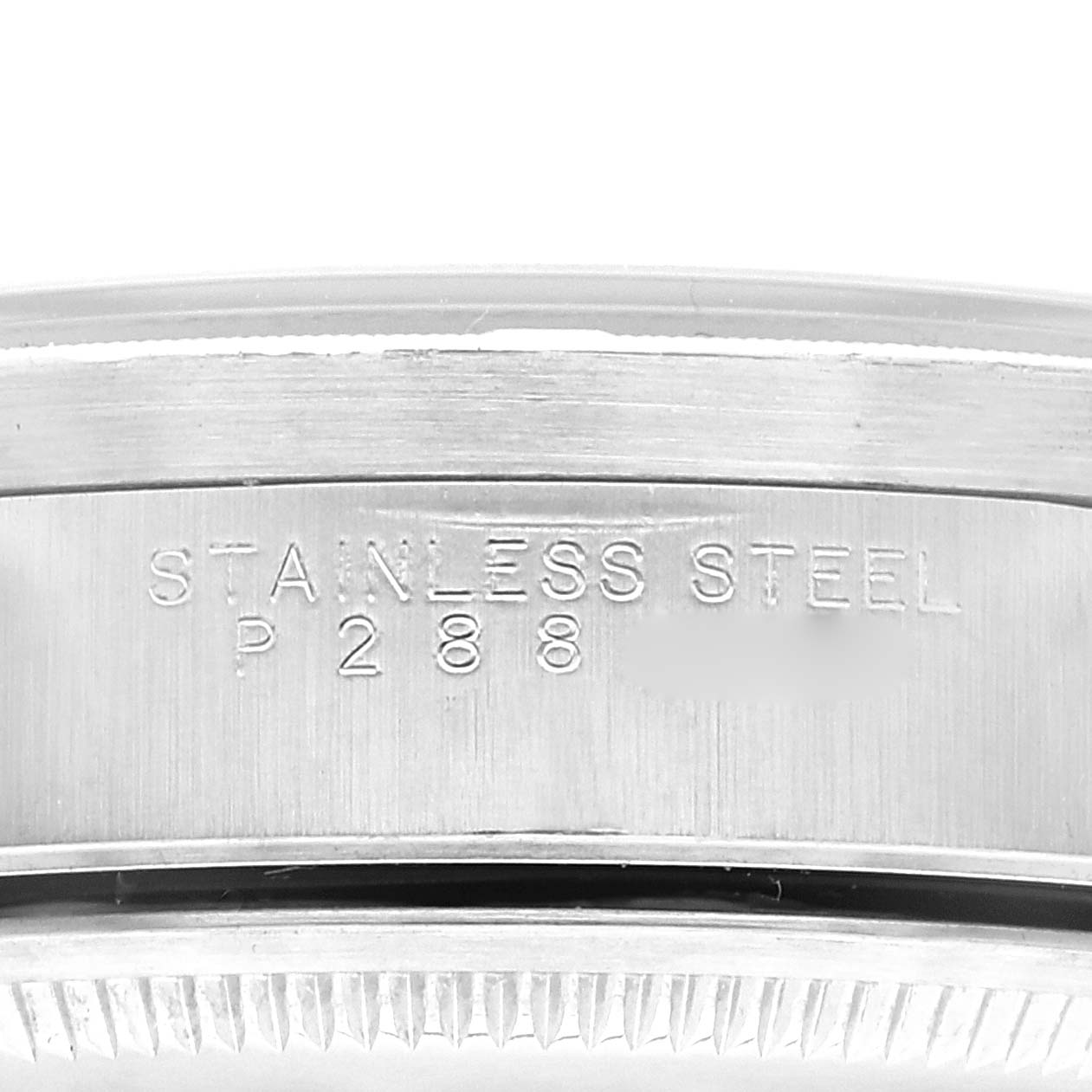 This image shows a close-up of the stainless steel case side of a Rolex Air-King 14010 Men's Stainless Steel Blue Dial 14010 Men's Stainless Steel Blue Dial watch, showing the engraved text.
