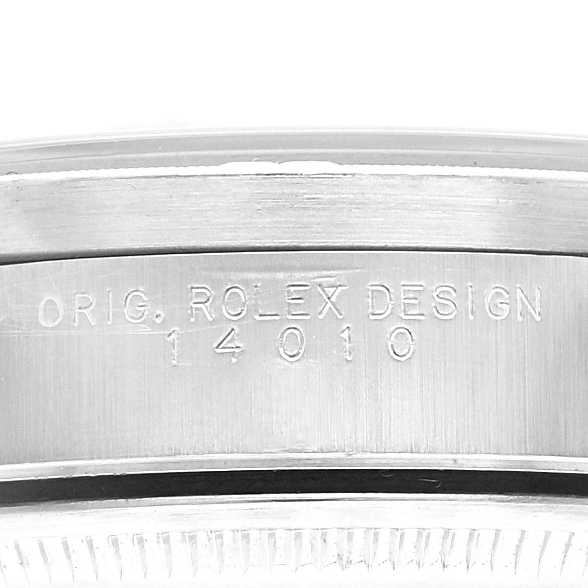 This image shows an angled view of the caseback side of a Rolex Air-King 14010 Men's Stainless Steel Blue Dial 14010 Men's Stainless Steel Blue Dial watch, featuring the model number 14010 engraved.