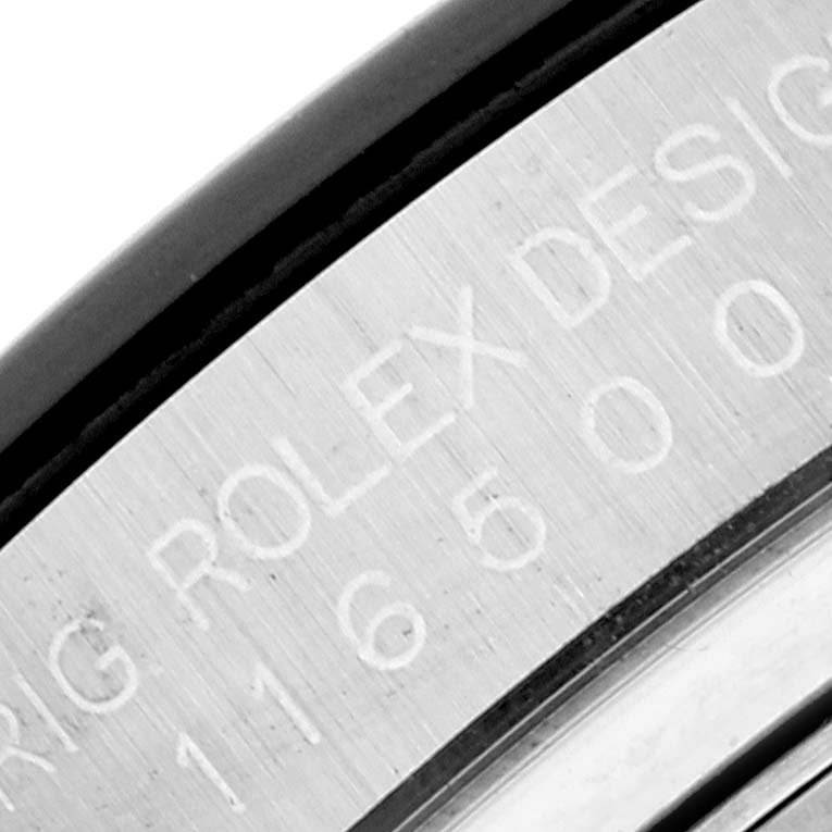 This image shows a close-up of the side case engraving on a Rolex Daytona 116500LN Men's Stainless Steel Black Dial 116500LN Men's Stainless Steel Black Dial watch.