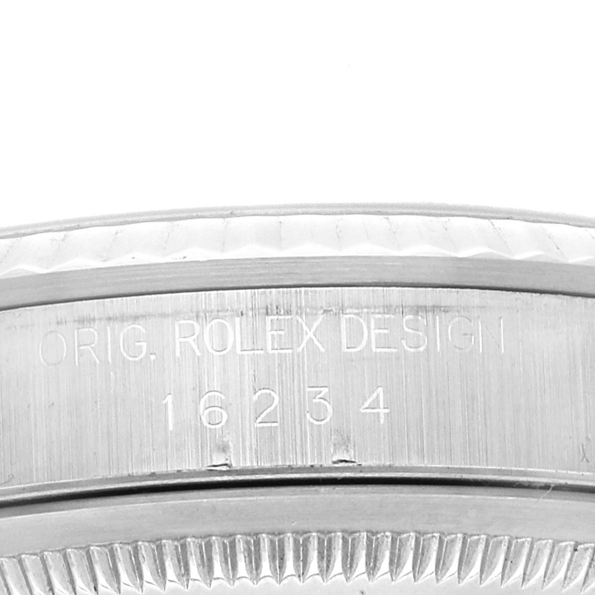 This image shows a close-up of the case side engraving on a Rolex Datejust 16234 Men's Stainless Steel Black Dial 16234 Men's Stainless Steel Black Dial model, highlighting the model number "16234."