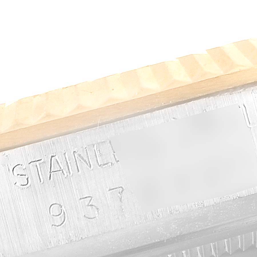 This close-up image shows the side view of the case, focusing on the engravings, for a Vintage Collection model by Rolex.